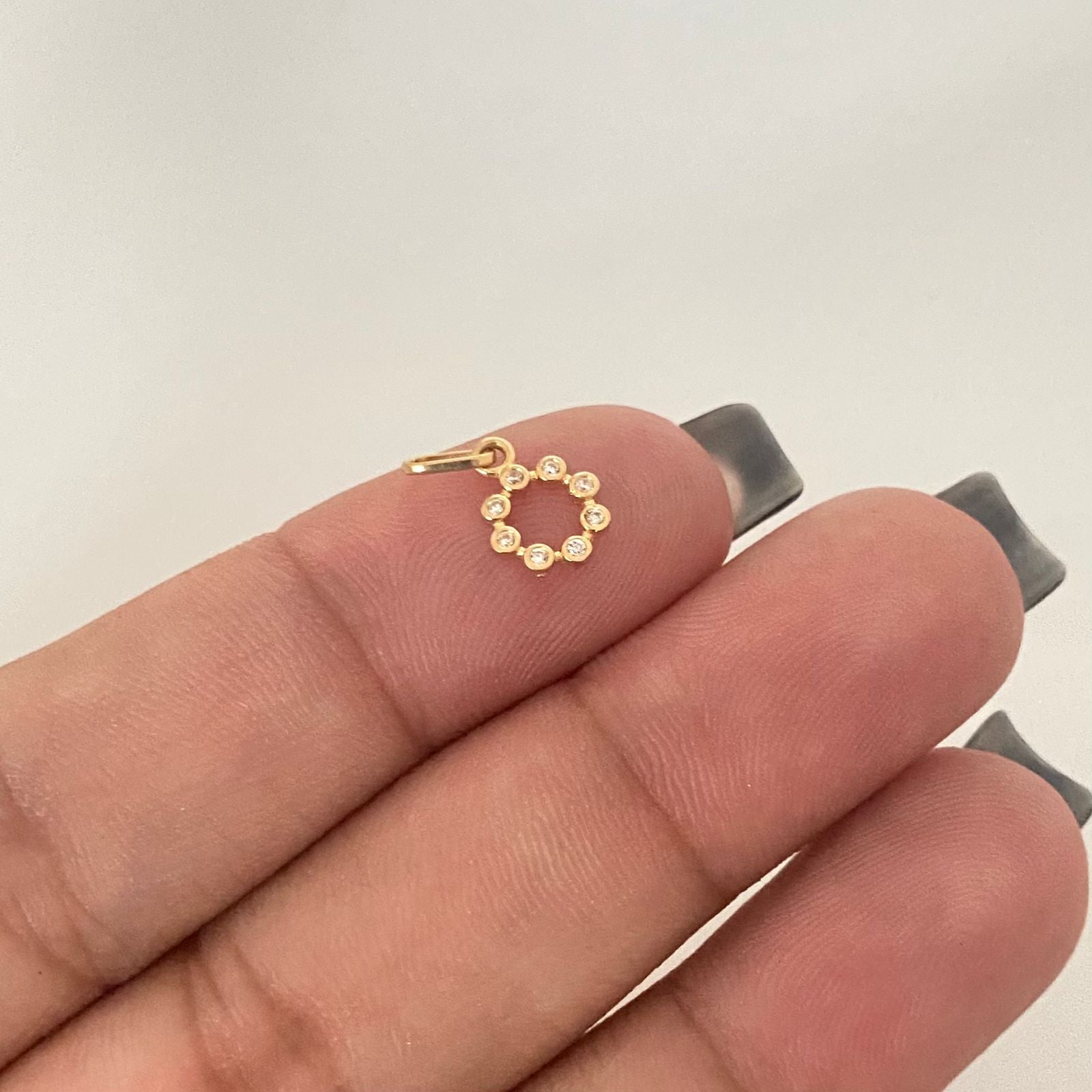 Dije dije circulo casting mini Oro amarillo 18k 0,35 Gr / 1,2 Cm