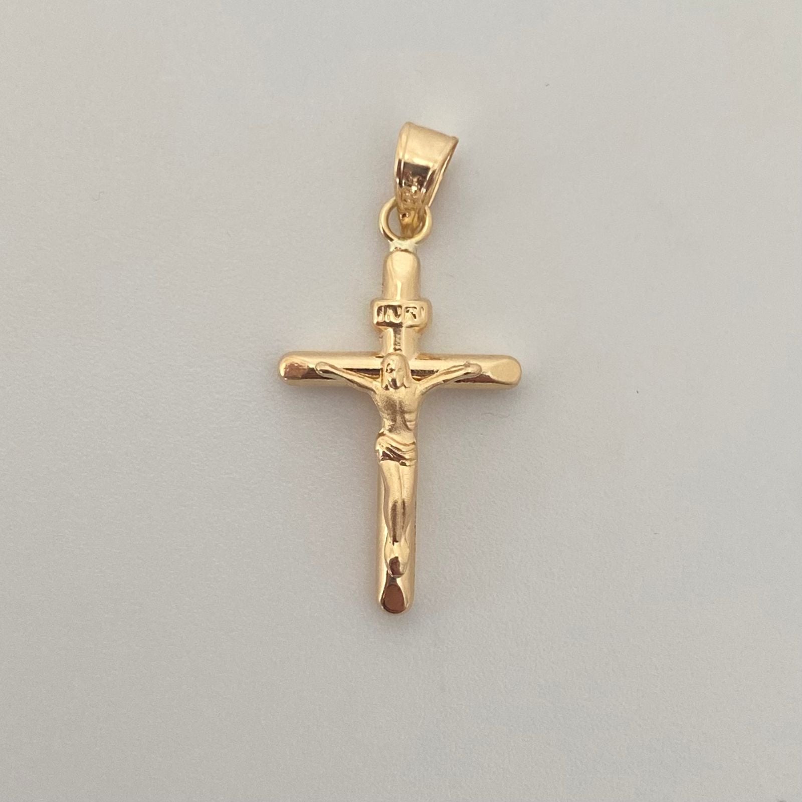Dije Cruz Cristo Tubular Oro amarillo 18k 0,7 Gr / 12,9 mm / 2,6 Cm
