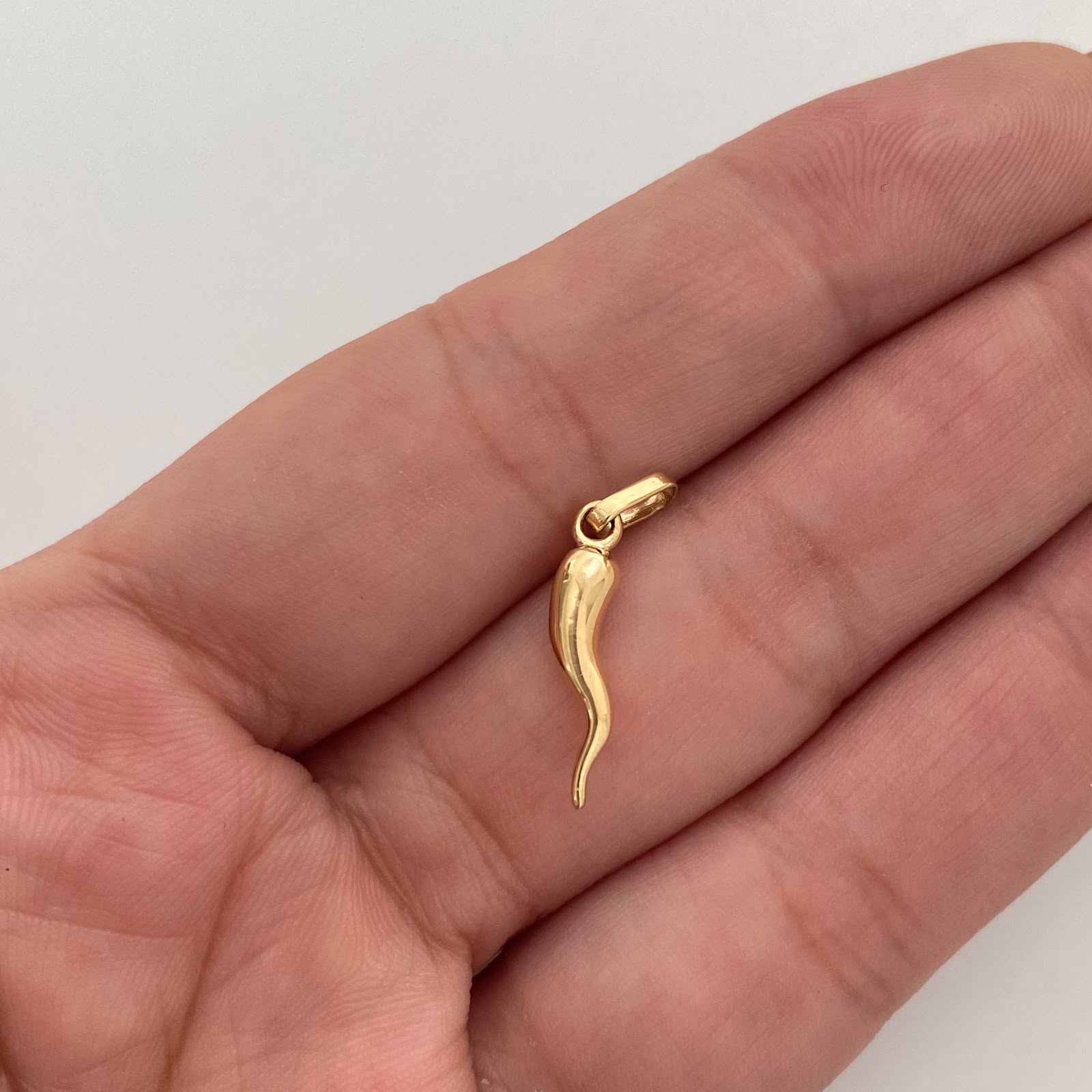 Dije Cuerno de la Abundancia Oro amarillo 18k 1,15 Gr / 3,8 mm / 2 Cm
