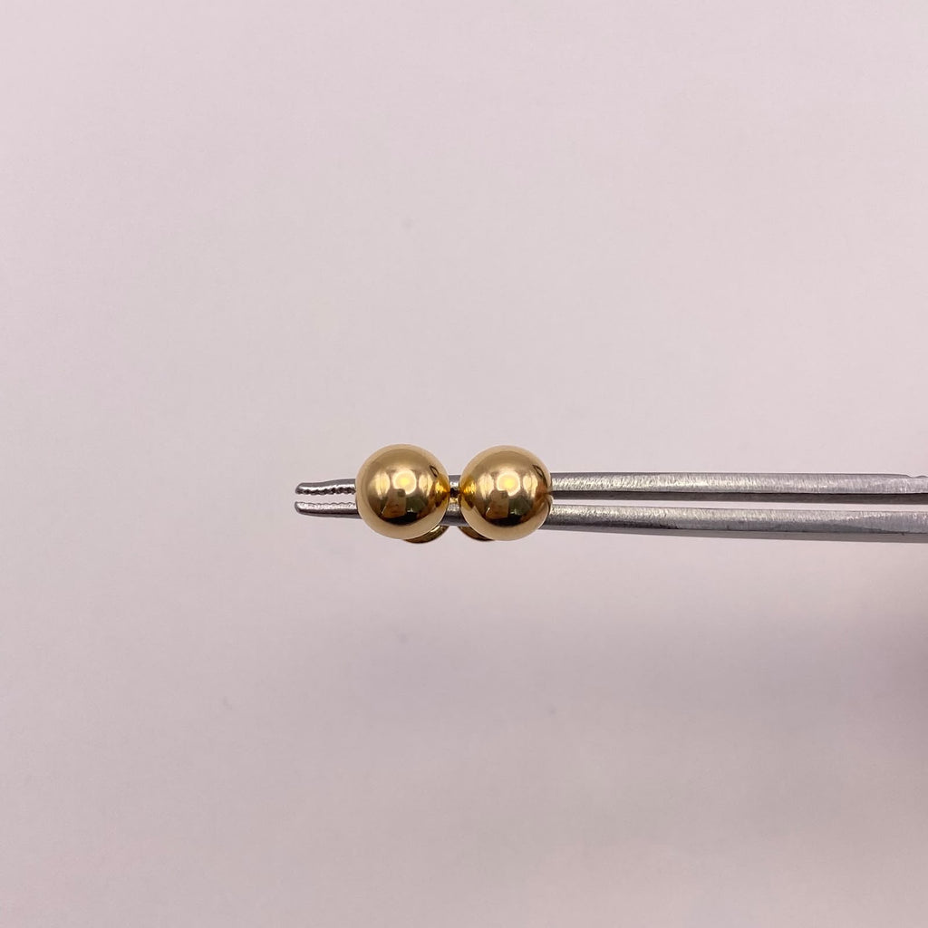 Topos bola lisa 7mm Oro amarillo 18k 0,8 Gr