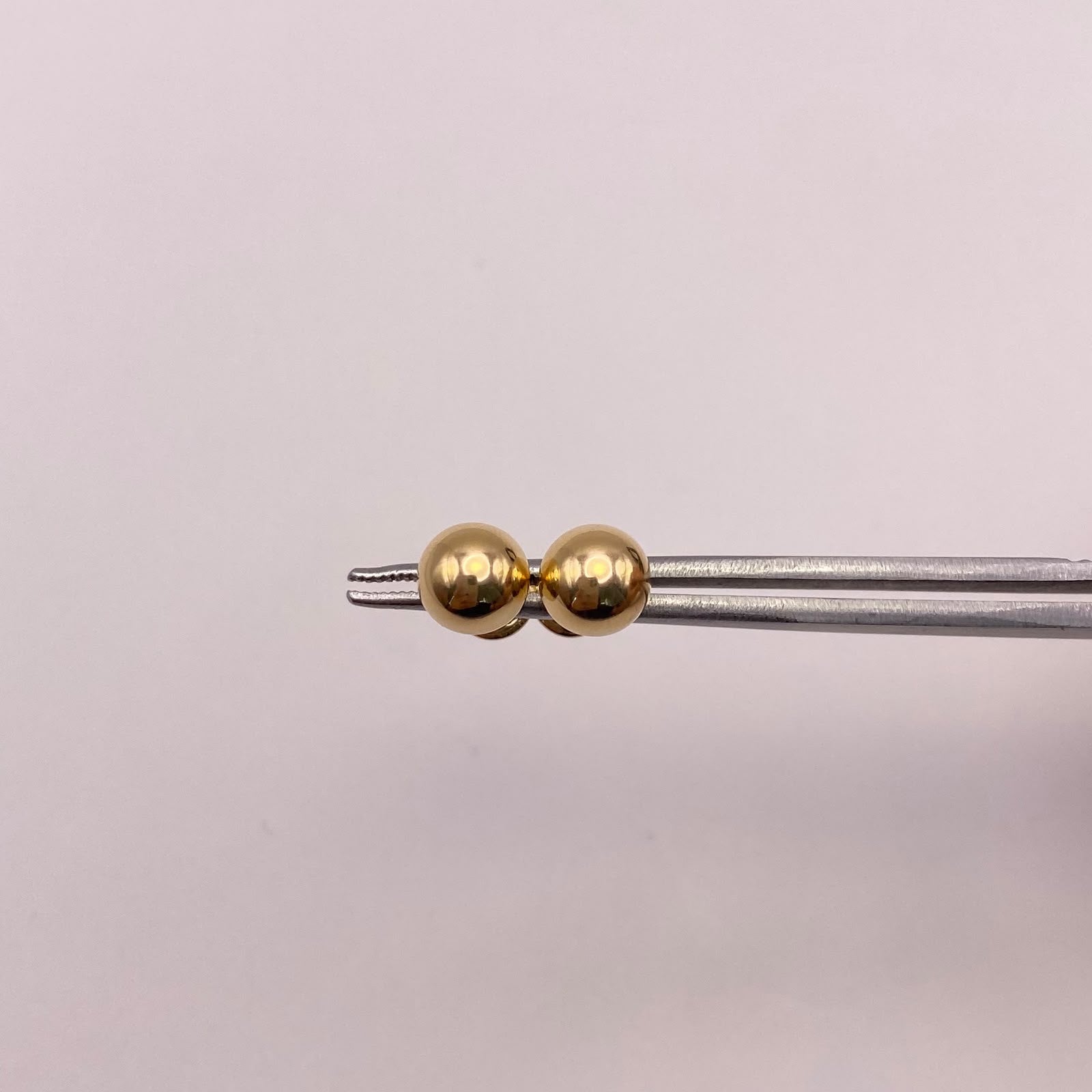 Topos bola lisa 7mm Oro amarillo 18k 0,8 Gr