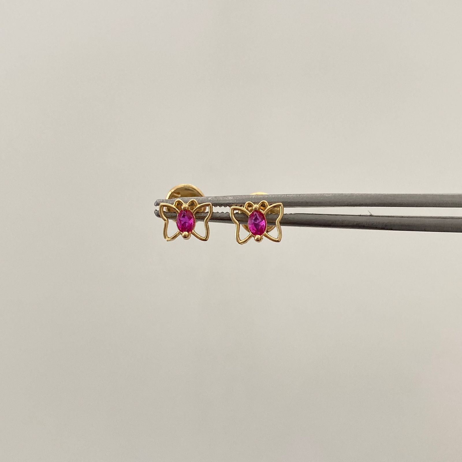Topos Mariposa circon fucsia Oro amarillo 18k 0,7 Gr / 6,5 mm
