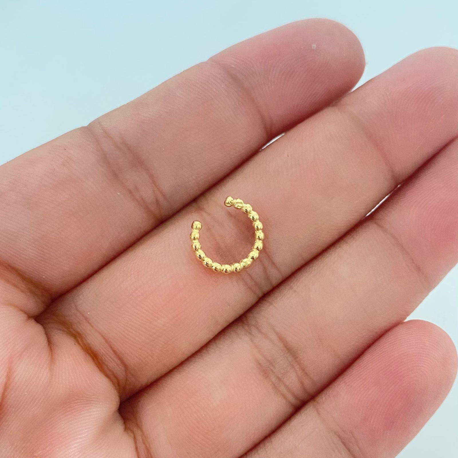 Piercing ear cuff entorchado ( joya ) Oro amarillo 18k 0,55 Gr