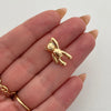 Dije oso mano alzada  Oro amarillo 18k 1,35 Gr / 11,1 mm / 1,5 Cm