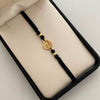 Pulsera tejida Signo peso bolas diamantada 4mm negro Oro amarillo 18k 0,75 Gr