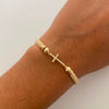 Pulsera tejida Cruz Casting Bolas Diamantadas 5,4mm Oro amarillo 18k 0,9 Gr