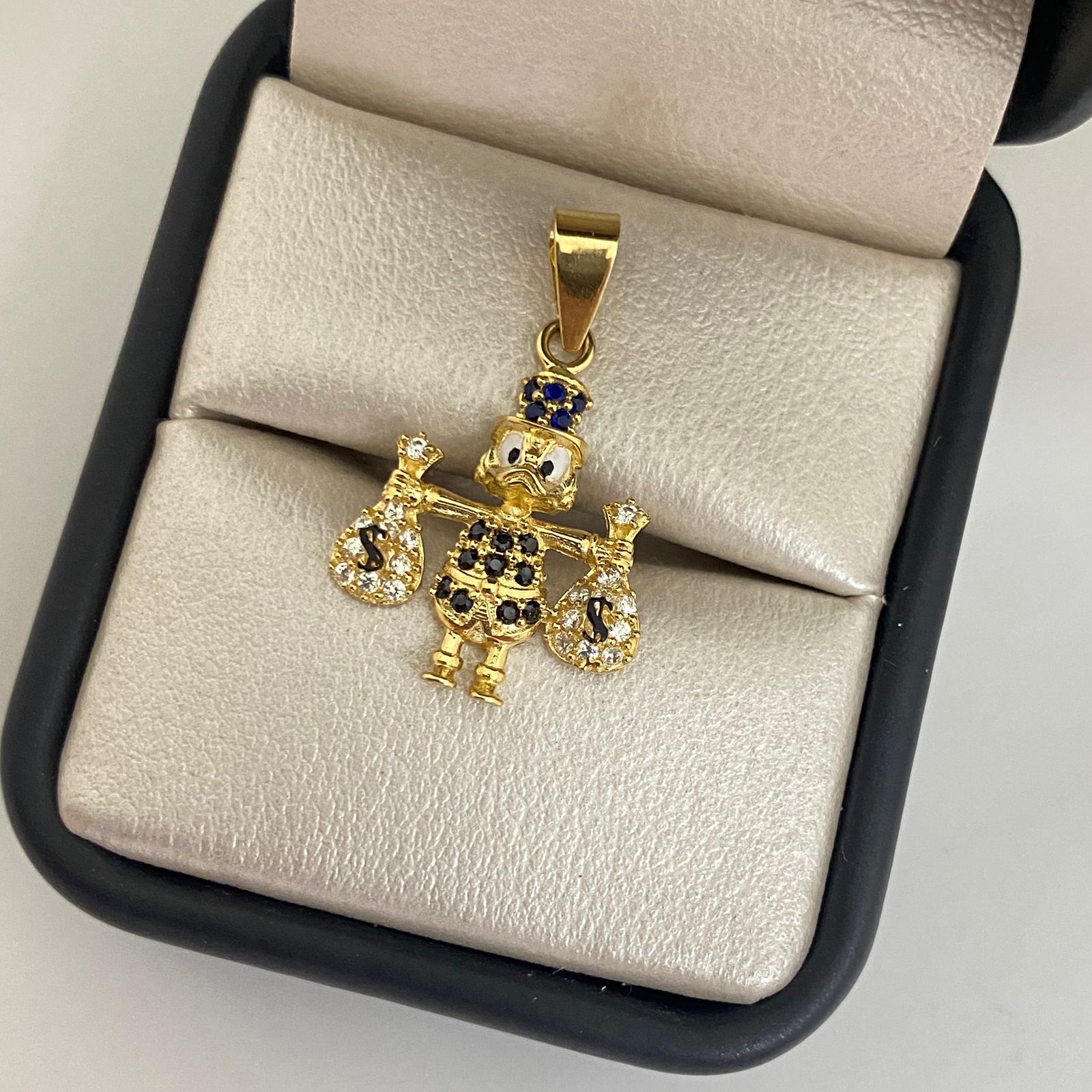 Dije tío rico casting central azul Oro amarillo 18k 3,05 Gr / 3,0 Cm