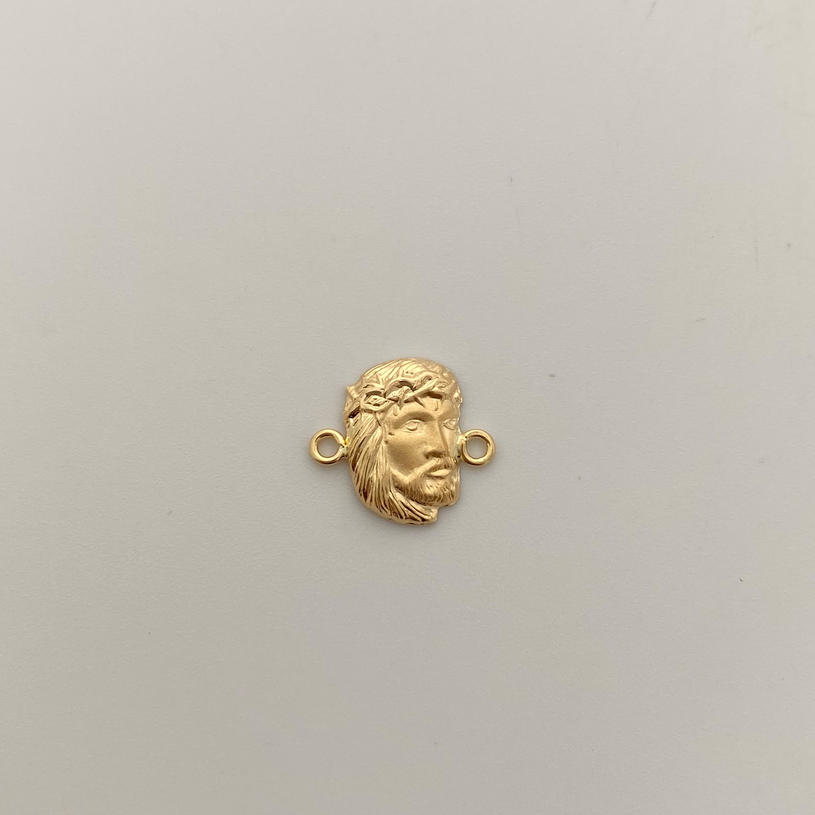 Herraje Rostro Oro amarillo 18k 0,75 Gr / 1,6 Cm