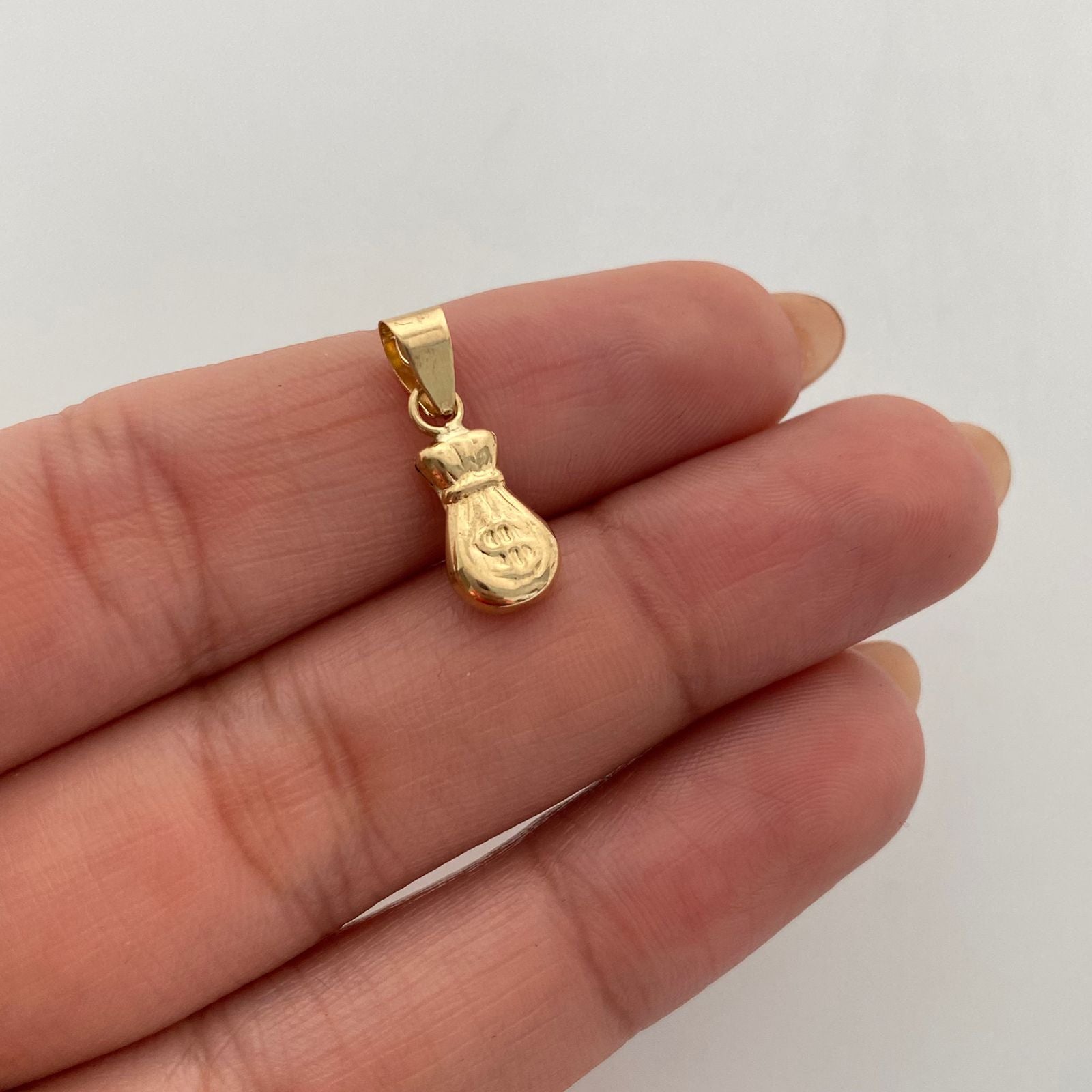 Dije Bolsa de valores Oro amarillo 18k 0,55 Gr / 6,8 mm / 2 Cm