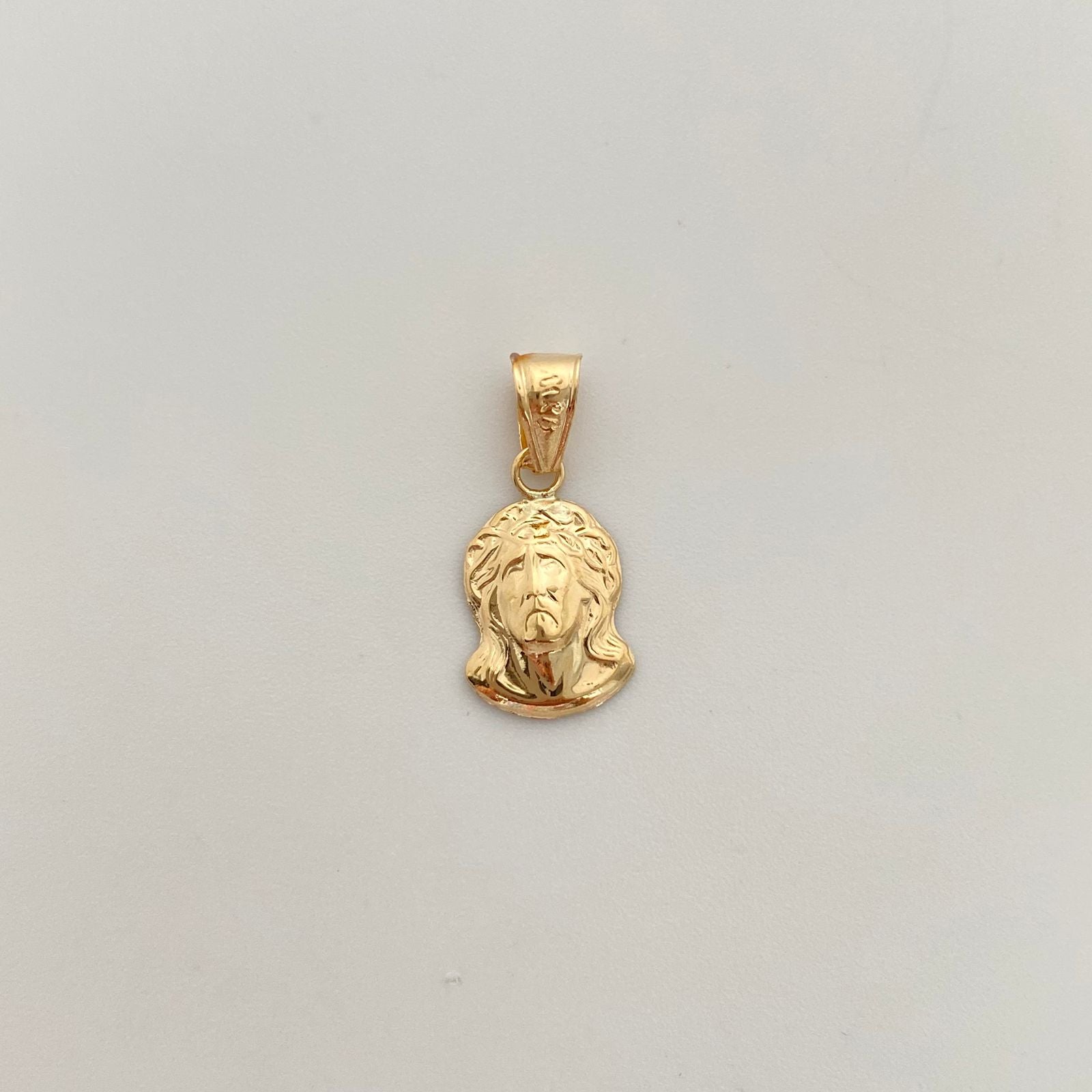 Dije rostro jesus  Oro amarillo 18k 0,7 Gr / 9,1 mm / 2 Cm