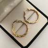 Candonga entorchada lisa  Oro amarillo 18k 2,45 Gr / 2,6 Cm