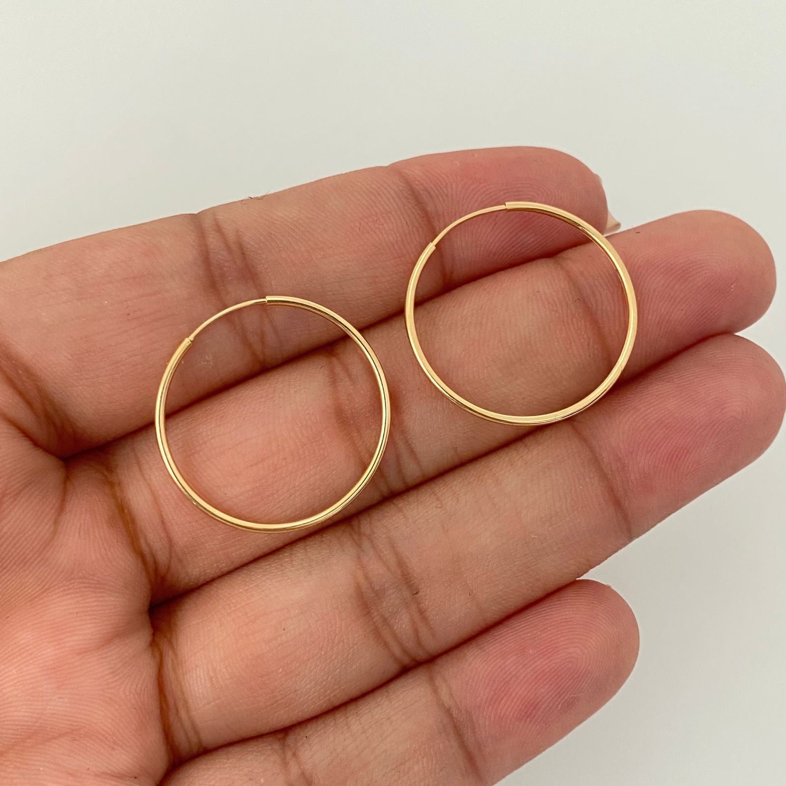 Candonga imperdible lisa Oro amarillo 18k 1,10 Gr / 2,5 Cm