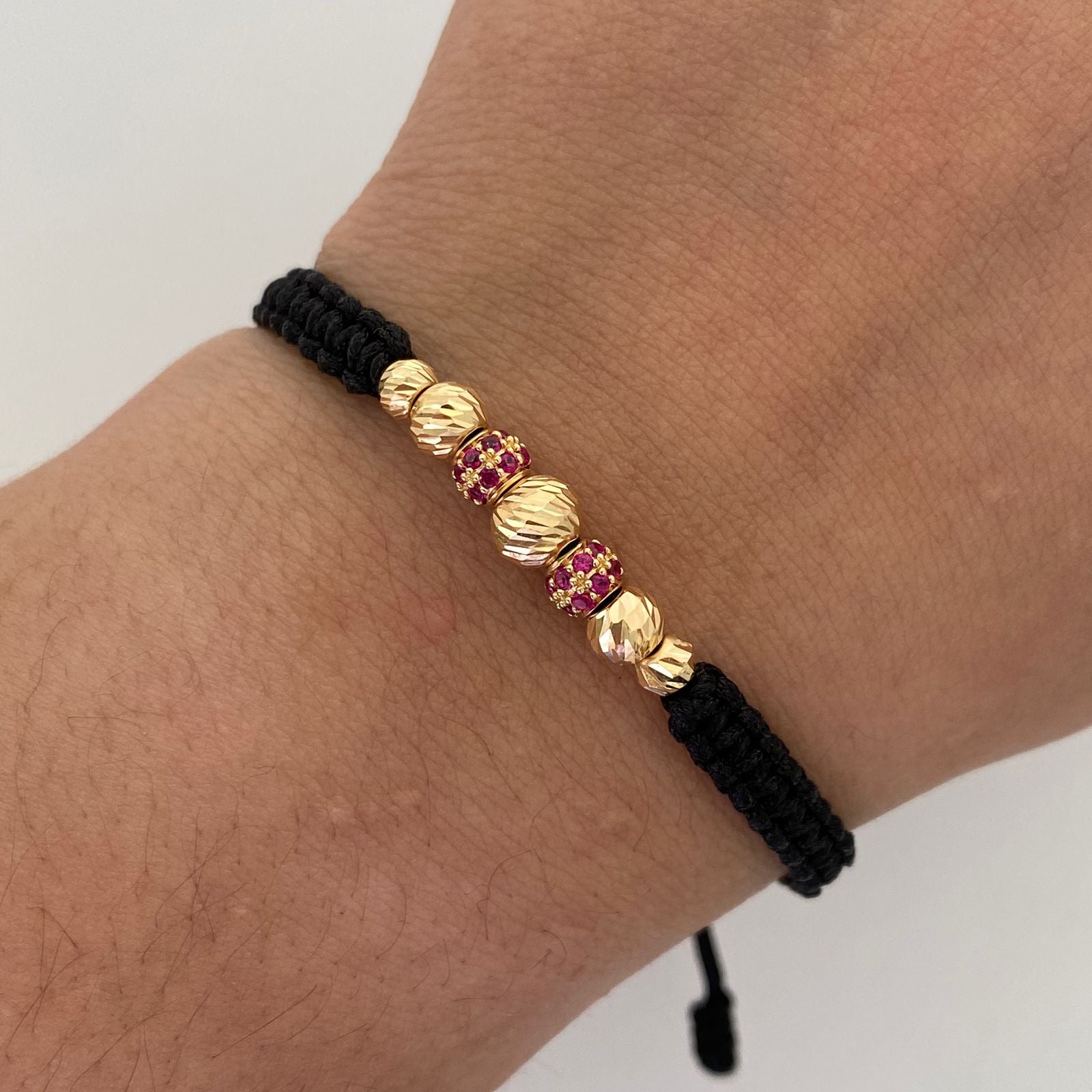 Pulsera tejida Bolas de fuego casting rosada bolas diamantadas 5,6 y 4mm Oro amarillo 18k 1,05 Gr