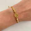Pulsera tejida con herraje letra c y balines diamantados 4mm Oro amarillo 18k 1,25 Gr