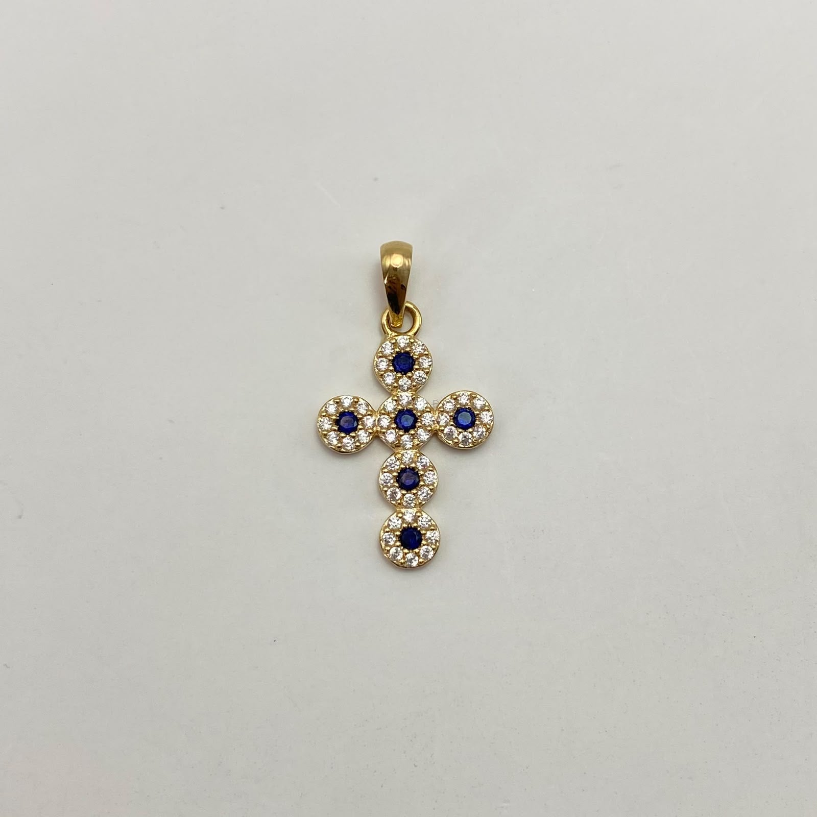 Dije cruz circulos circones azul oscuro y blancos Oro amarillo 18k 2,20 Gr / 16,6 mm / 3 Cm