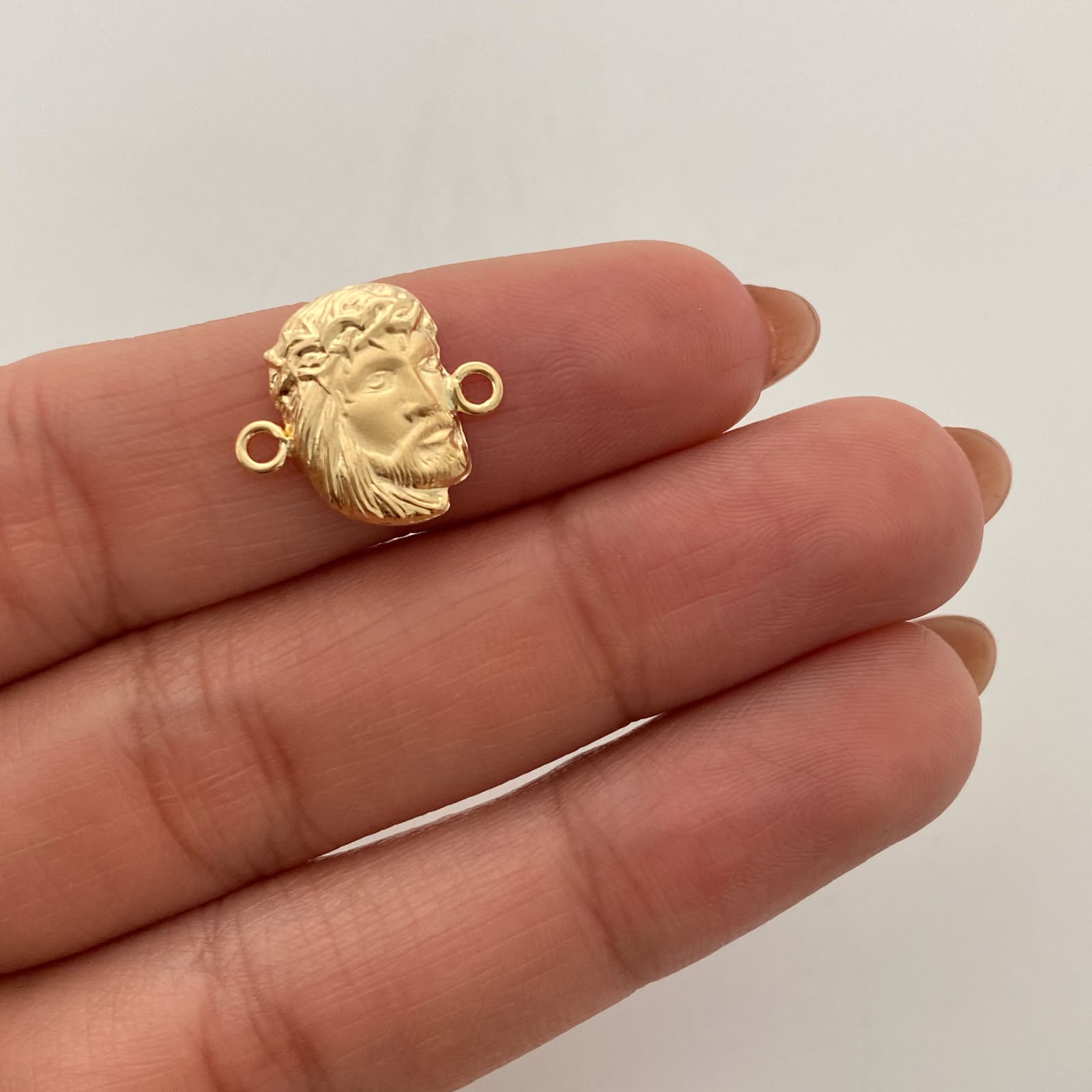Herraje Rostro Oro amarillo 18k 0,75 Gr / 1,6 Cm