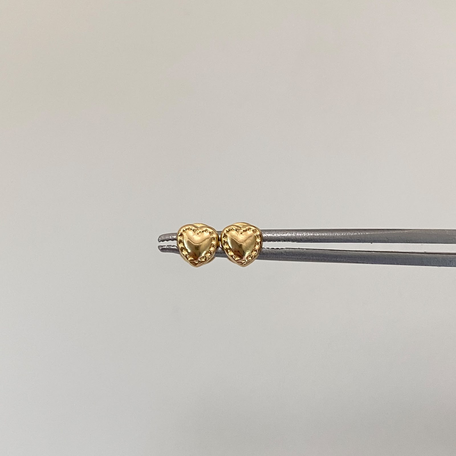 Topos corazon inflado borde punticos Oro amarillo 18k 0,45 Gr / 5 mm