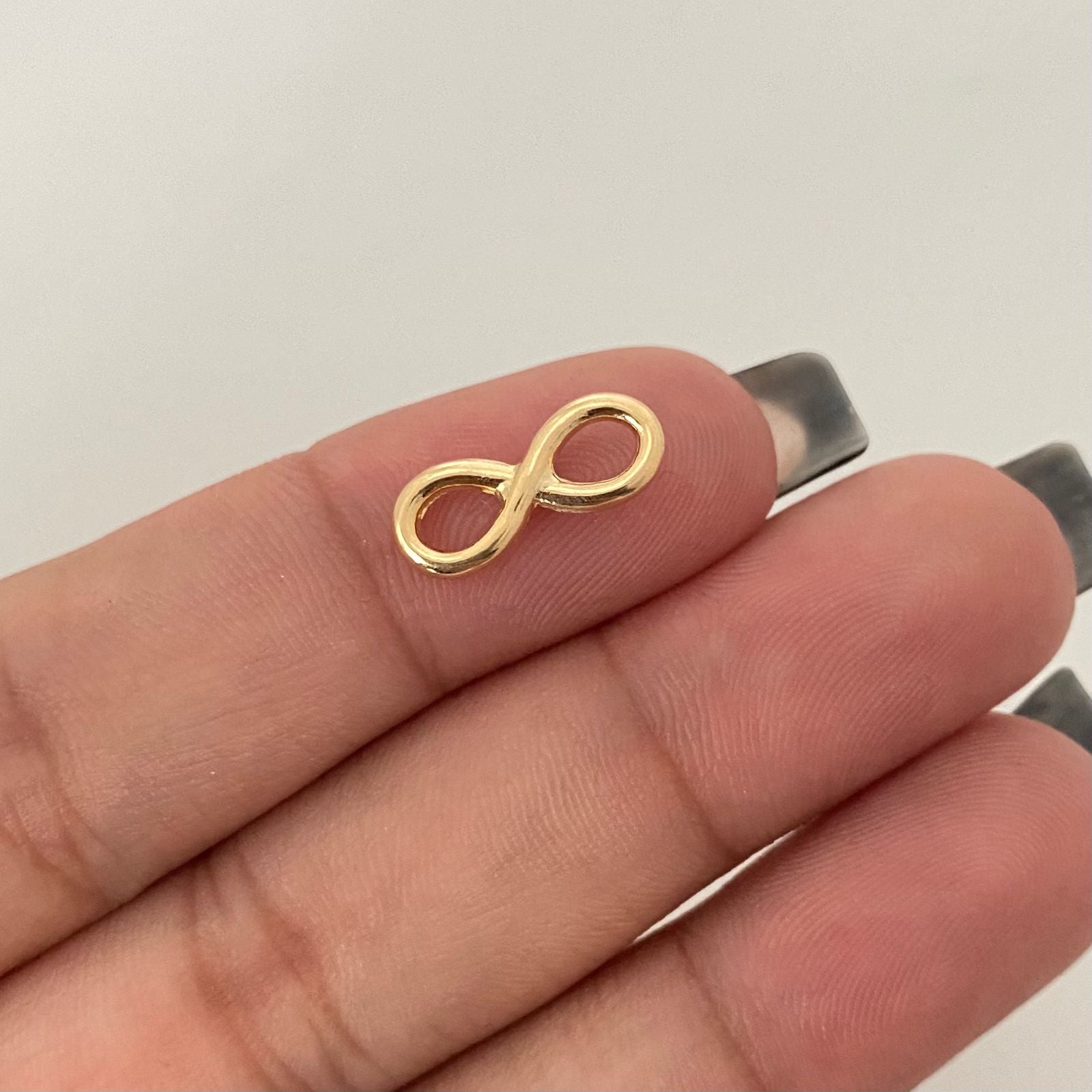 Herraje infinito Oro amarillo 18k 0,5 Gr / 1,5 Cm