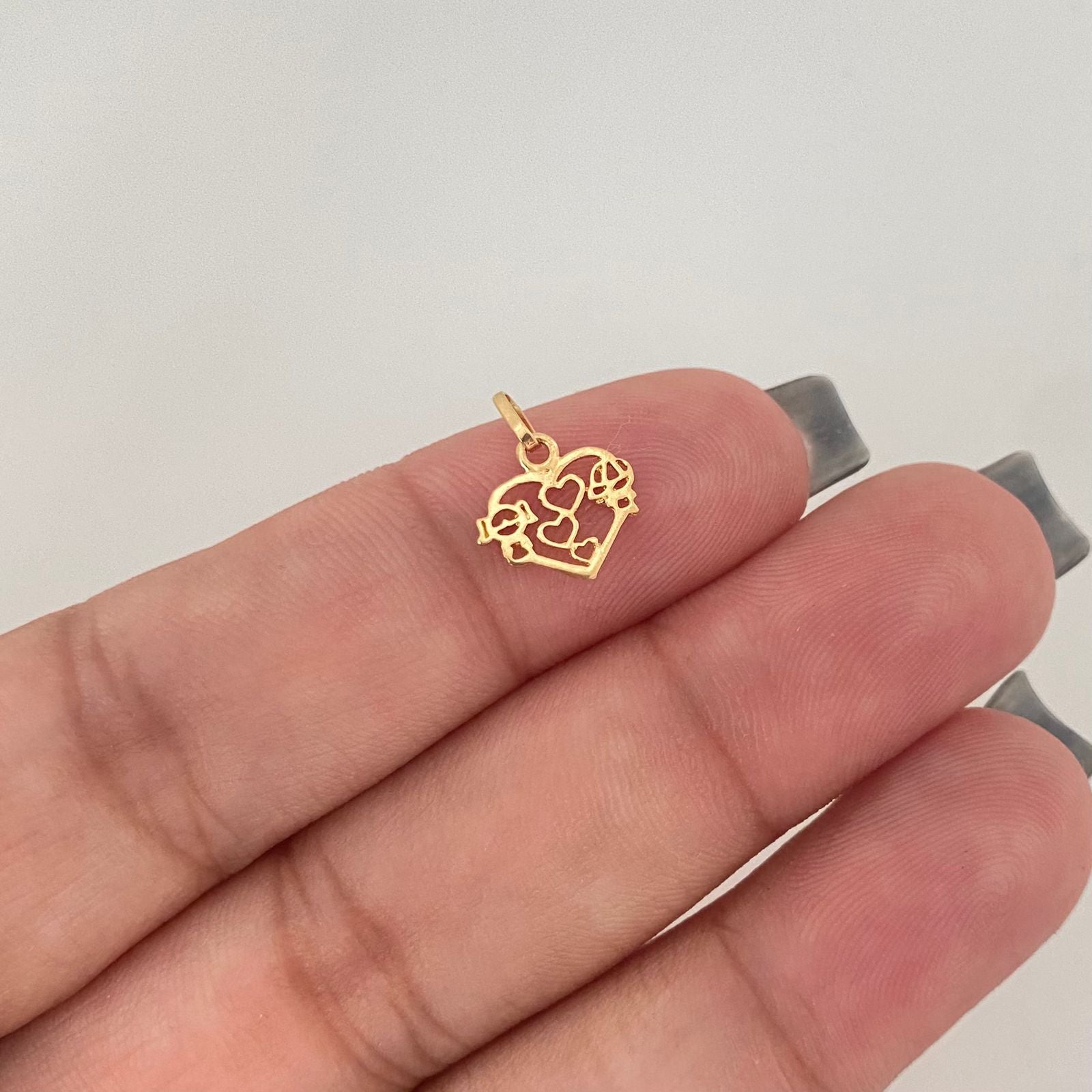 Dije corazón esquina niños centro mini corazones Oro amarillo 18k 0,35 Gr / 1,2 Cm