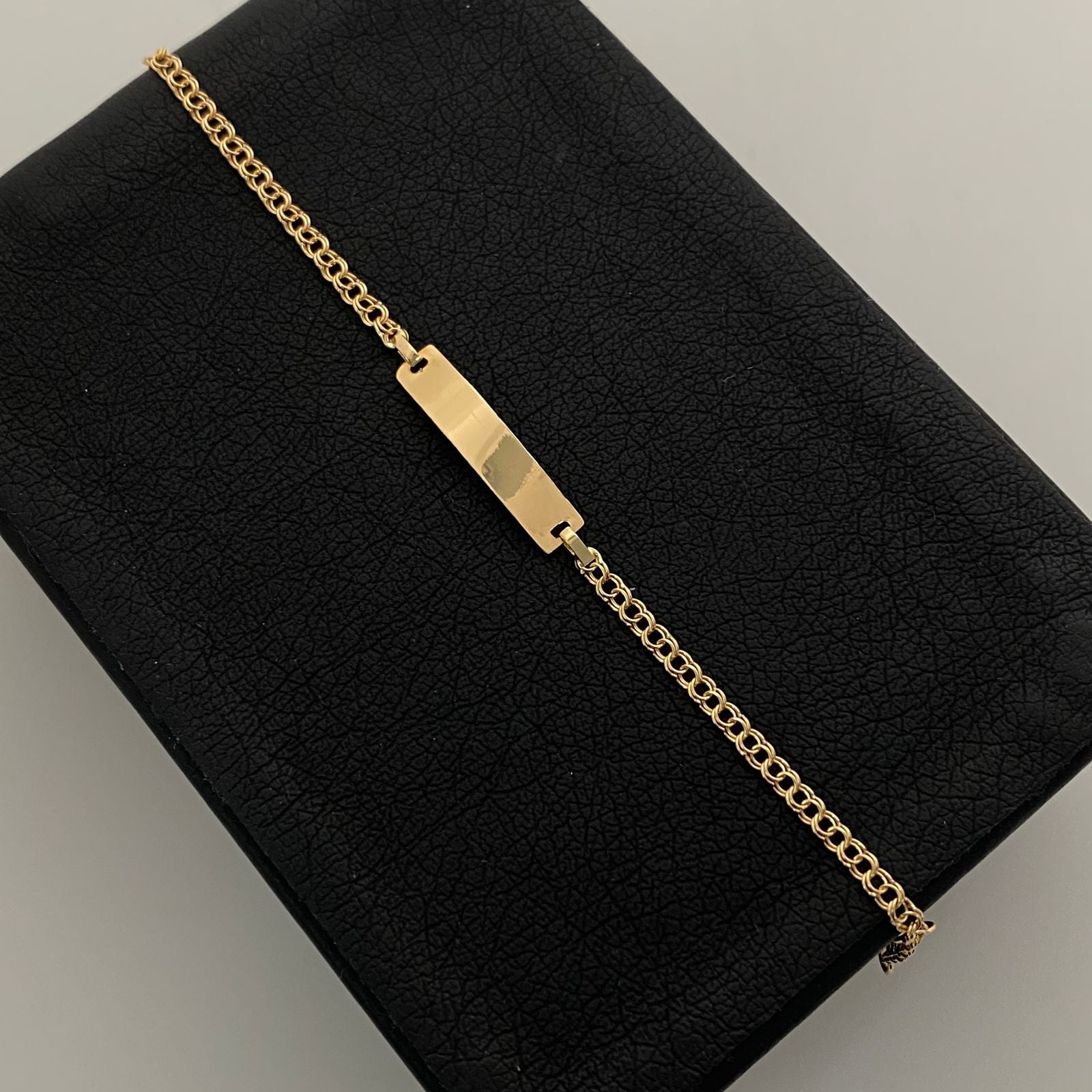 Pulso bebé aro seguido placa rectangular  Oro amarillo 18k 1,45 Gr / 4,4 mm / 15 Cm Broche 0,15