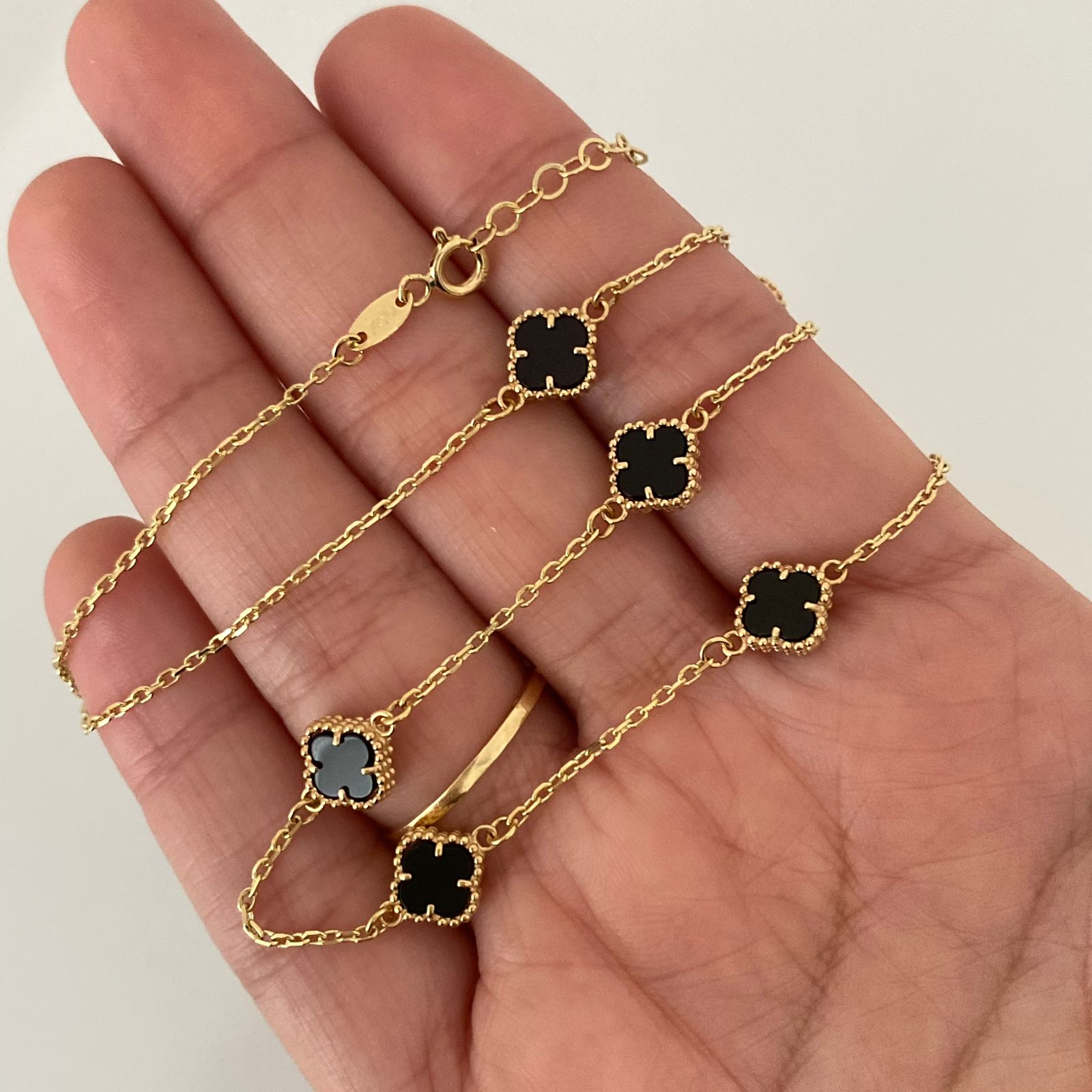 Cadena It aro seguido con trebol negro  Oro amarillo 18k +4 / 6,75 Gr / 1,2 mm / 44 Cm