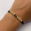 Pulsera tejida Bolas diamantadas 6mm y 5mm con neoro 3 rayas  Oro amarillo 18k 0,75 Gr