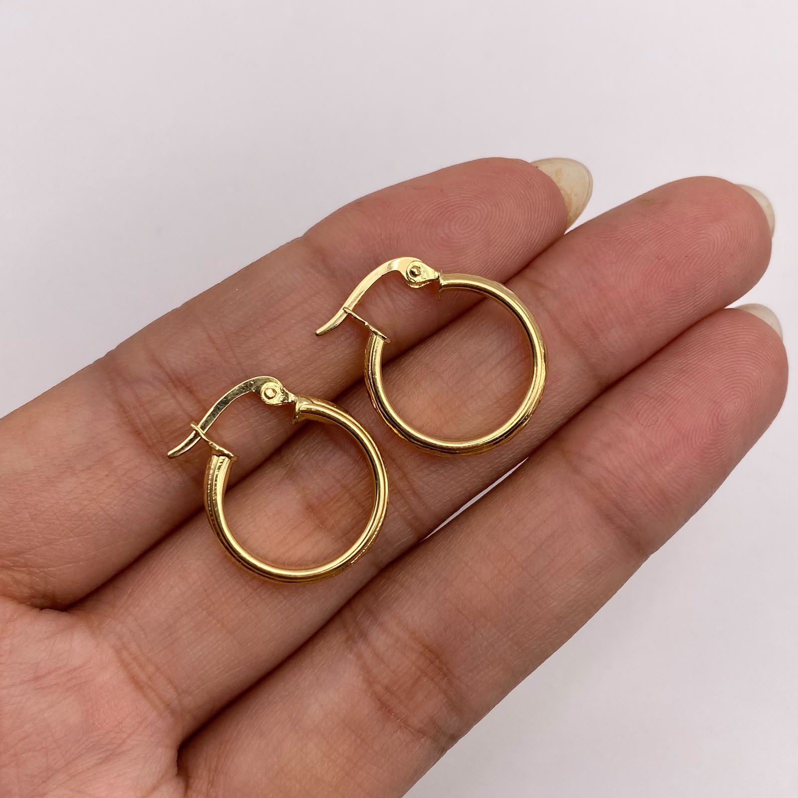 Candonga ovalada relieve Oro amarillo 18k 1,95 Gr / 2 Cm