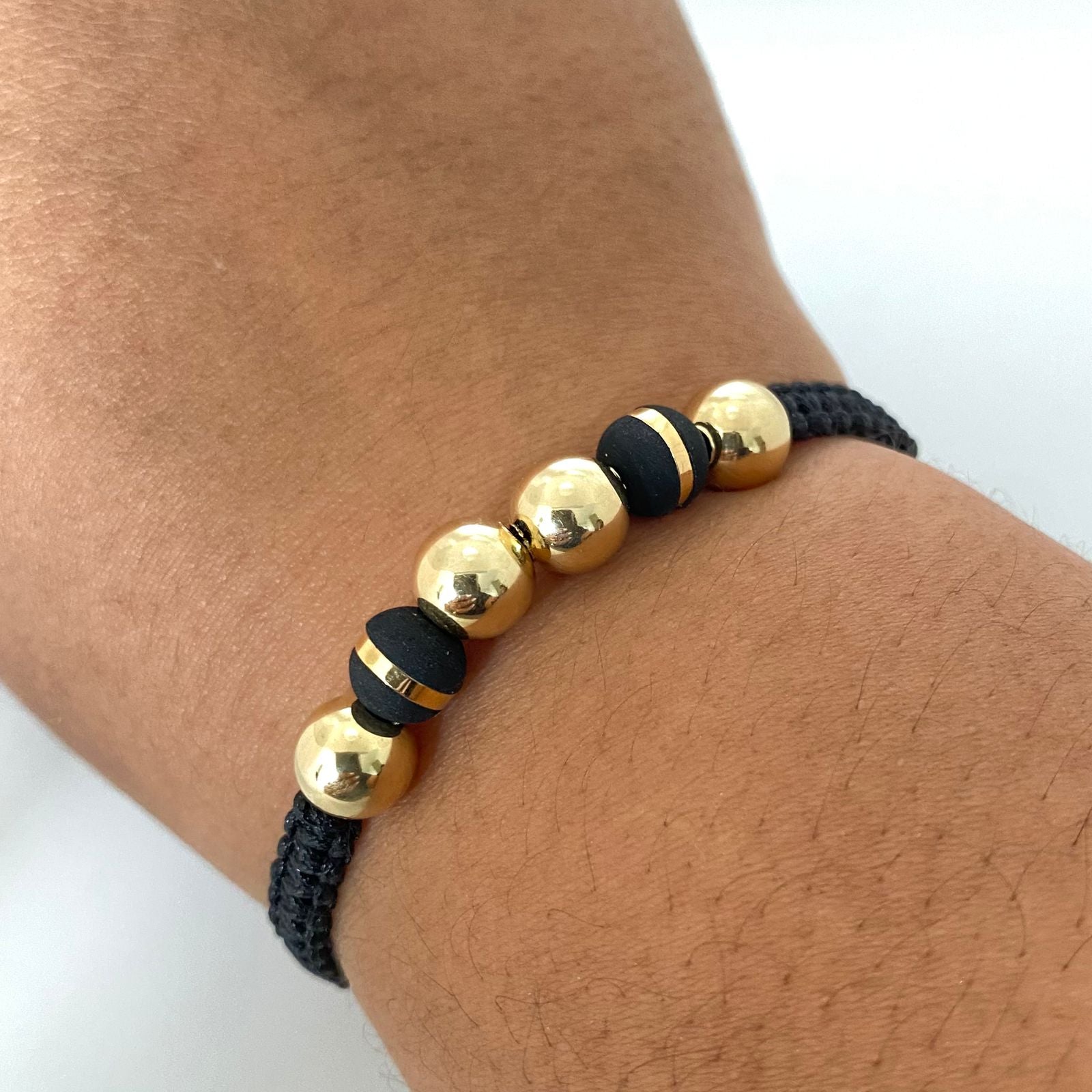 Pulsera tejida balines lisos #8 y neoros 1 raya #8 Oro amarillo 18k 1,55 Gr