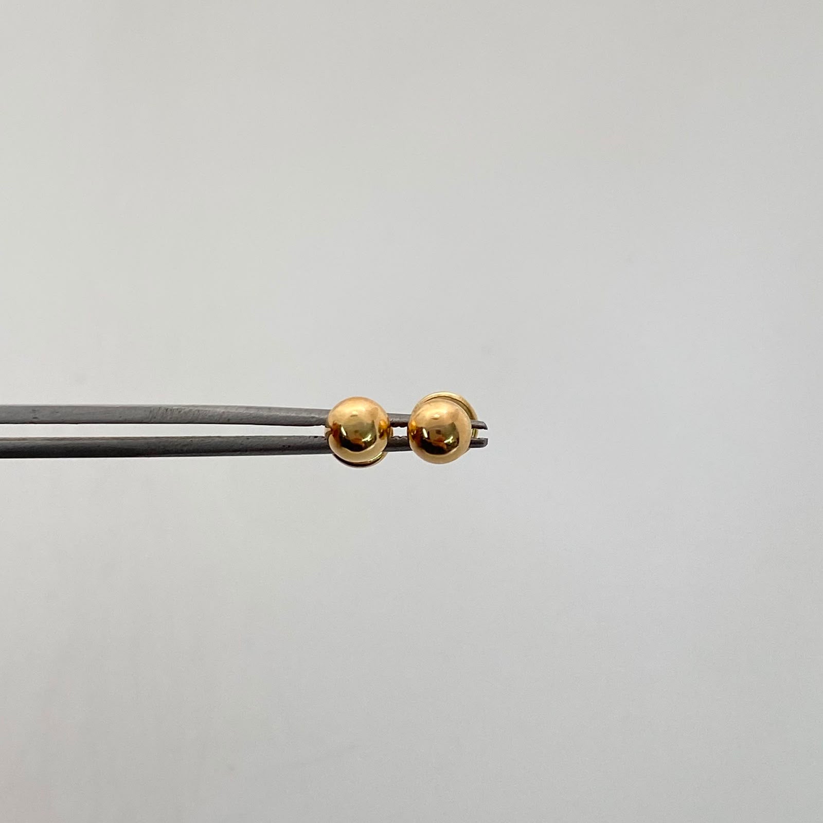Topos Bola Lisa 4mm Oro amarillo 18k 0,45 Gr