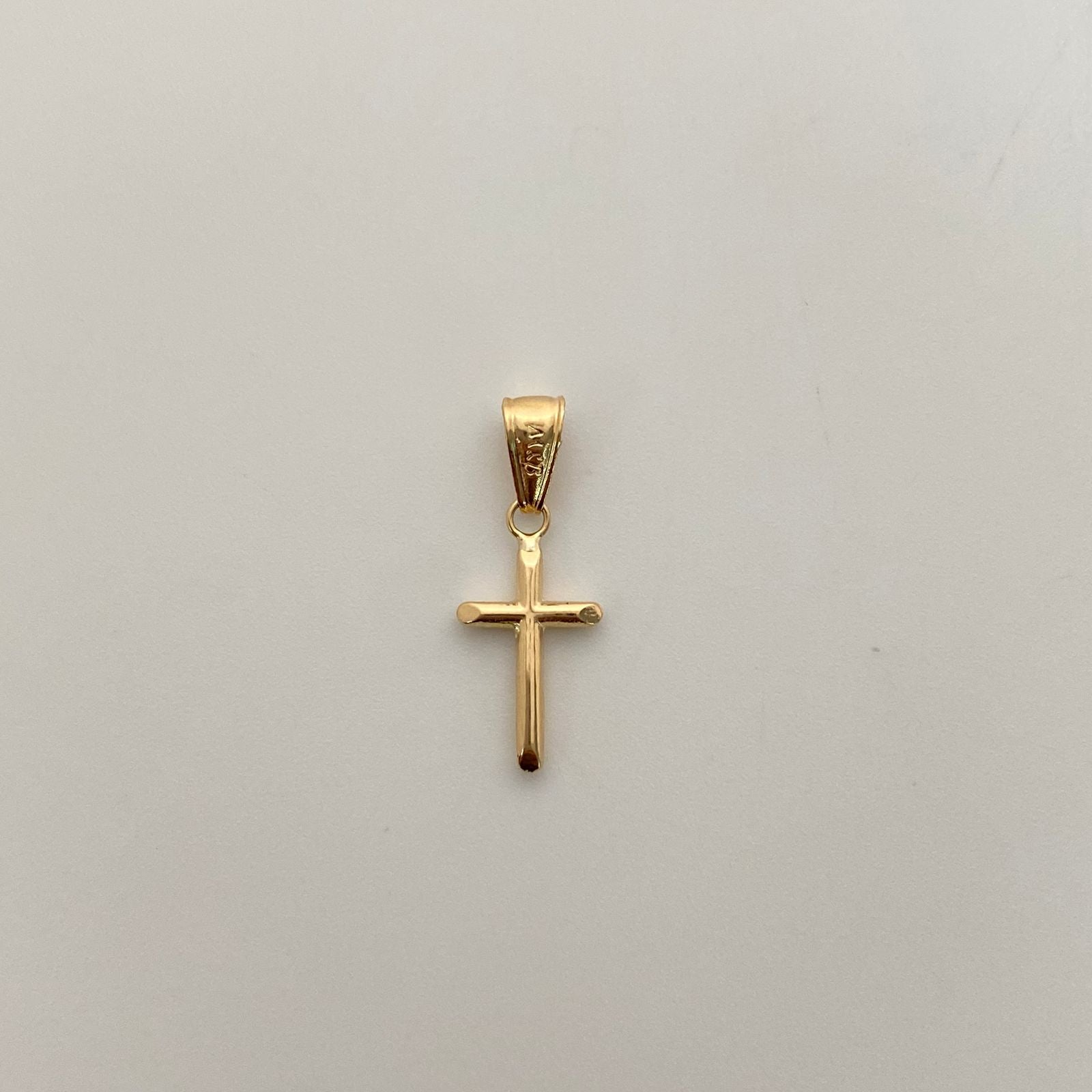 Dije Cruz Tubular Oro amarillo 18k 0,45 Gr / 9,6 mm / 2,4 Cm