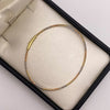 Aro It diamantado Tres oros 18k 2,09 Gr / 1,4 mm / 17,5 Cm