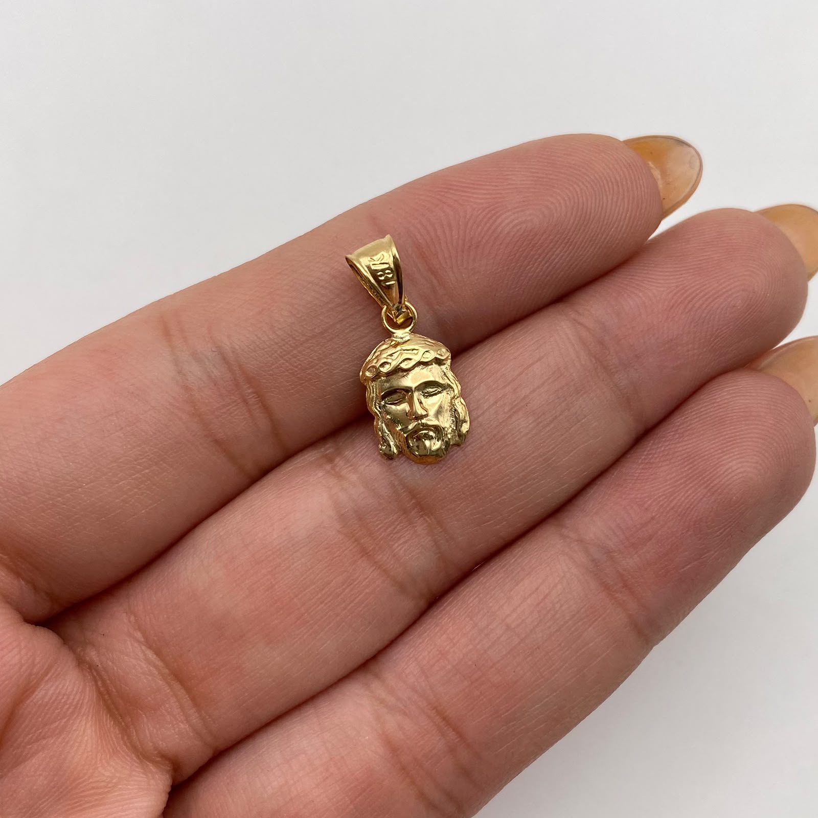 Dije rostro jesus Oro amarillo 18k 0,55 Gr / 7,8 mm / 2 Cm