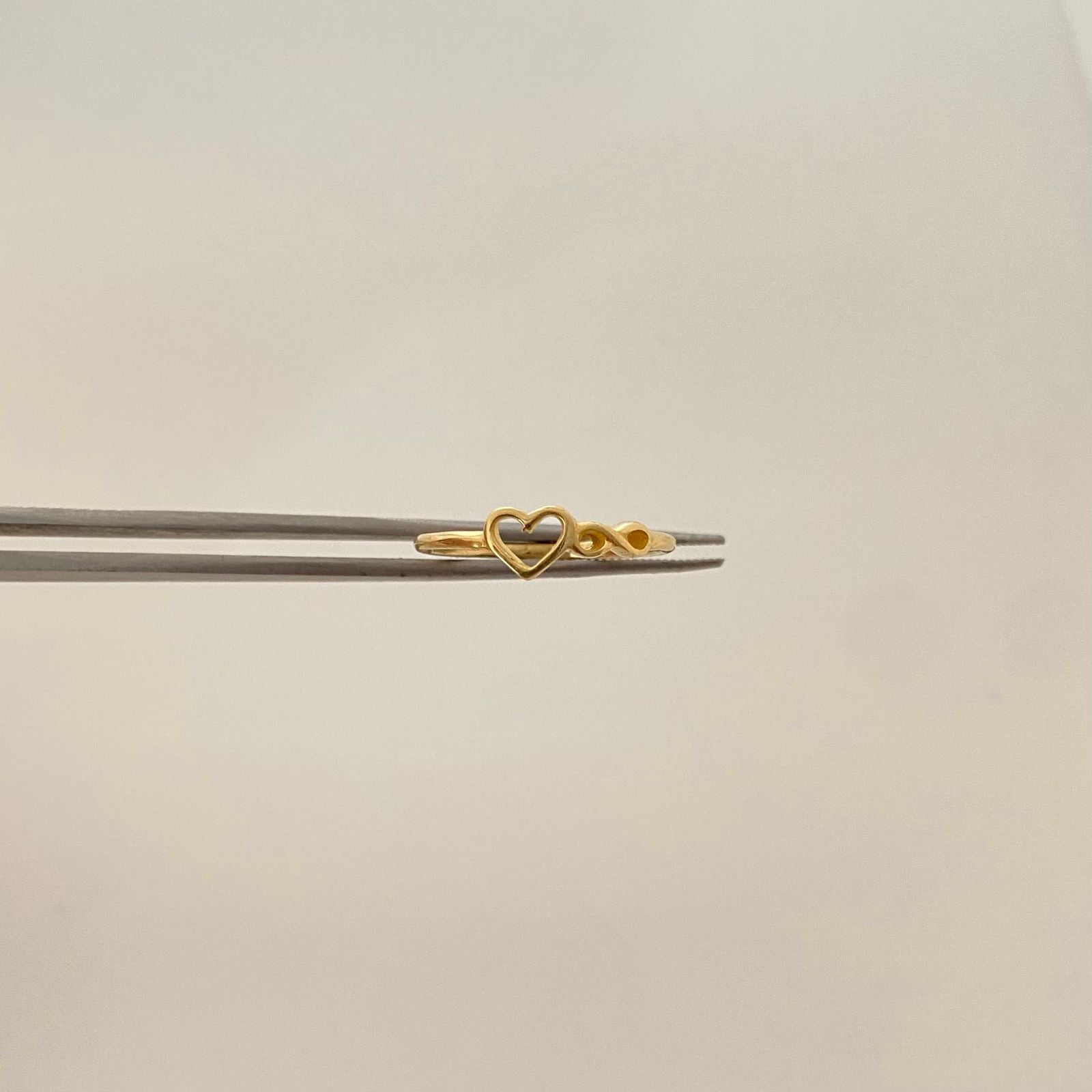 Anillo corazón infinito Oro amarillo 18k / Talla 6 / 1,25 Gr