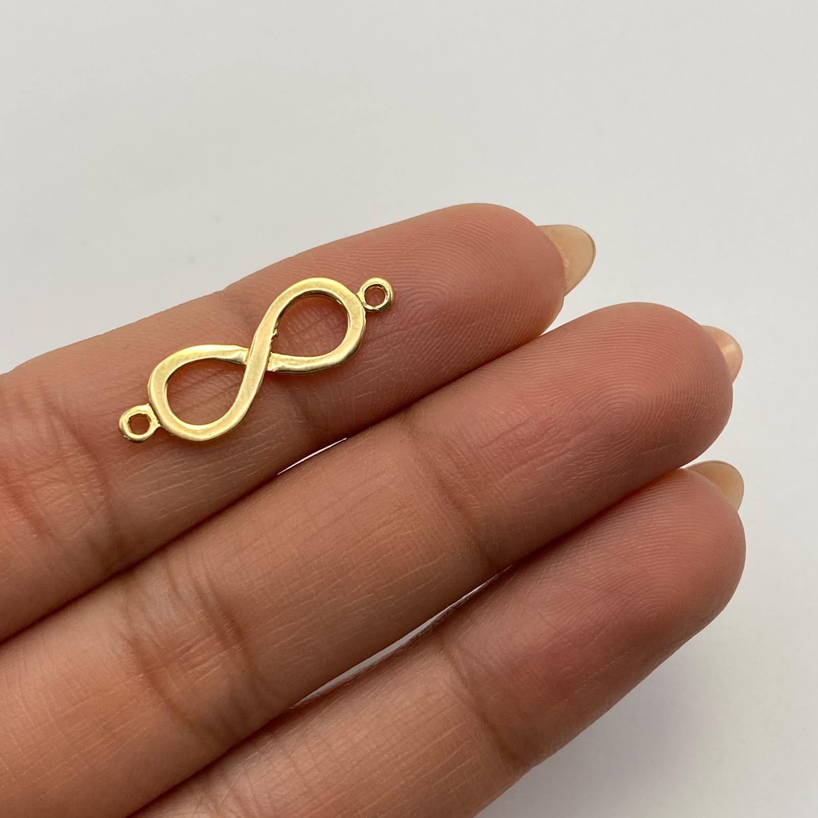 Herraje Infinito liso Oro amarillo 18k 1,05 Gr / 2,4 Cm
