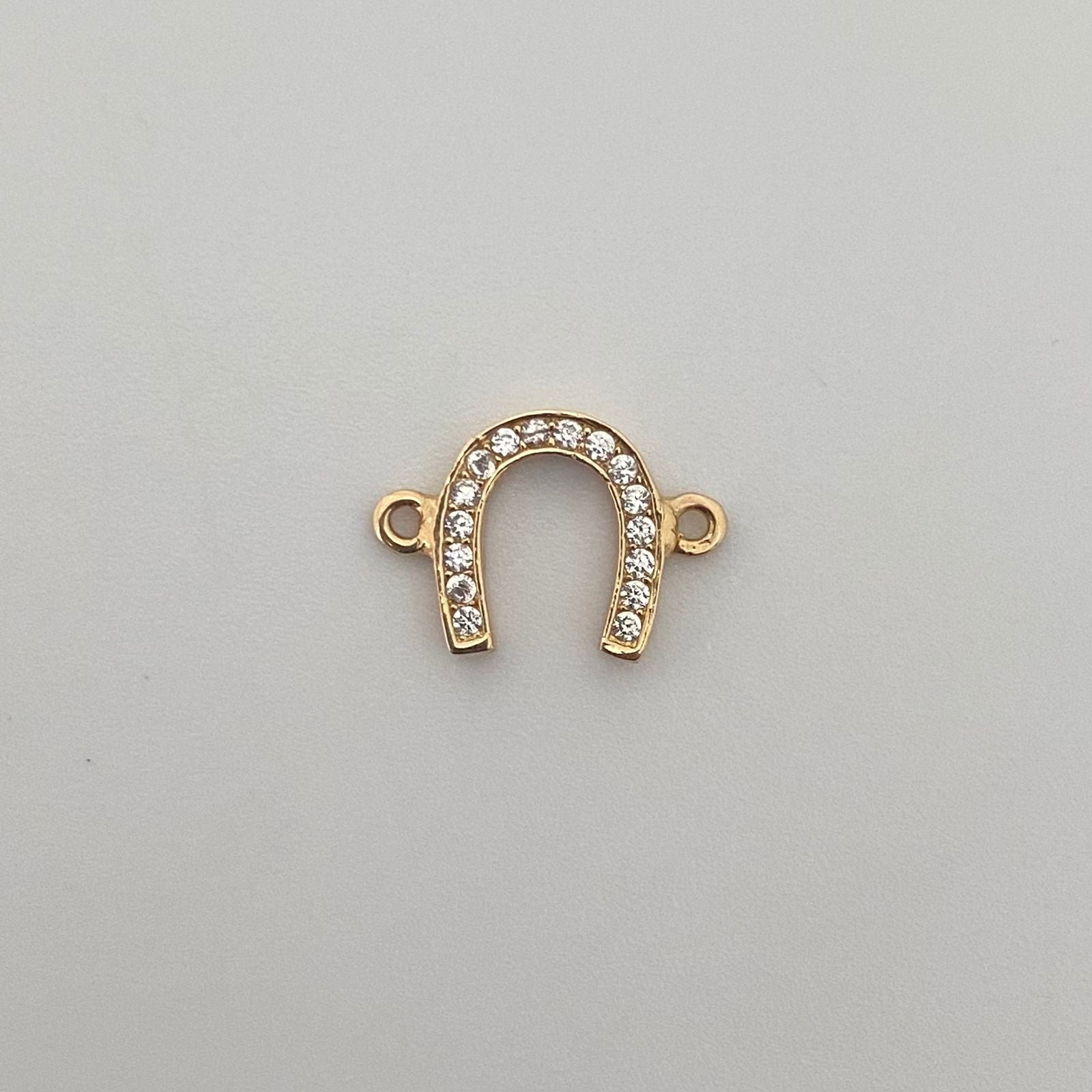 Herraje herradura de caballo casting Oro amarillo 18k 0,75 Gr / 1,5 Cm