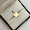 Dije placa lisa Oro amarillo 18k 0,95 Gr / 11,9 mm / 2,5 Cm