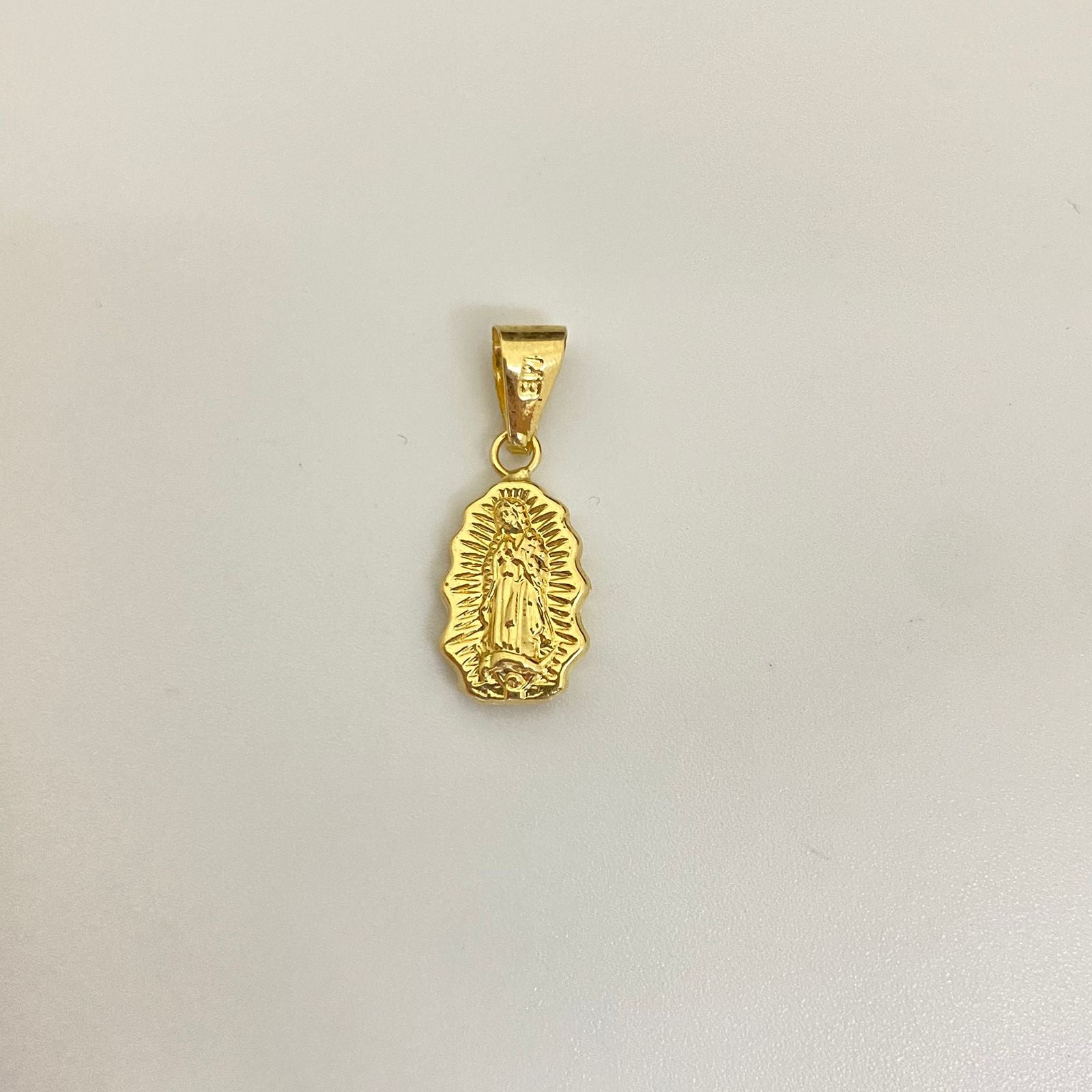 Dije silueta virgen guadalupe Oro amarillo 18k 0,7 Gr / 2,0 Cm