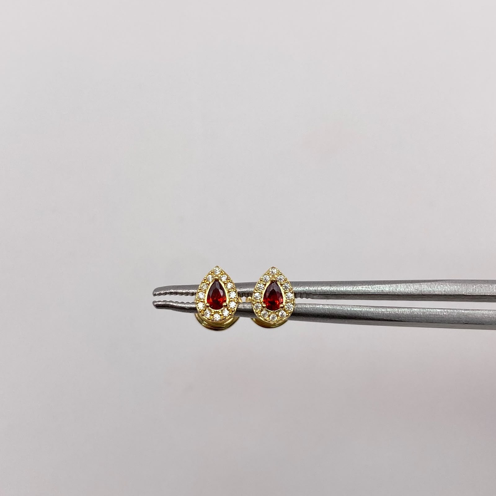 Topos gota circones blancos y cafe Oro amarillo 18k 0,7 Gr / 4,53 mm