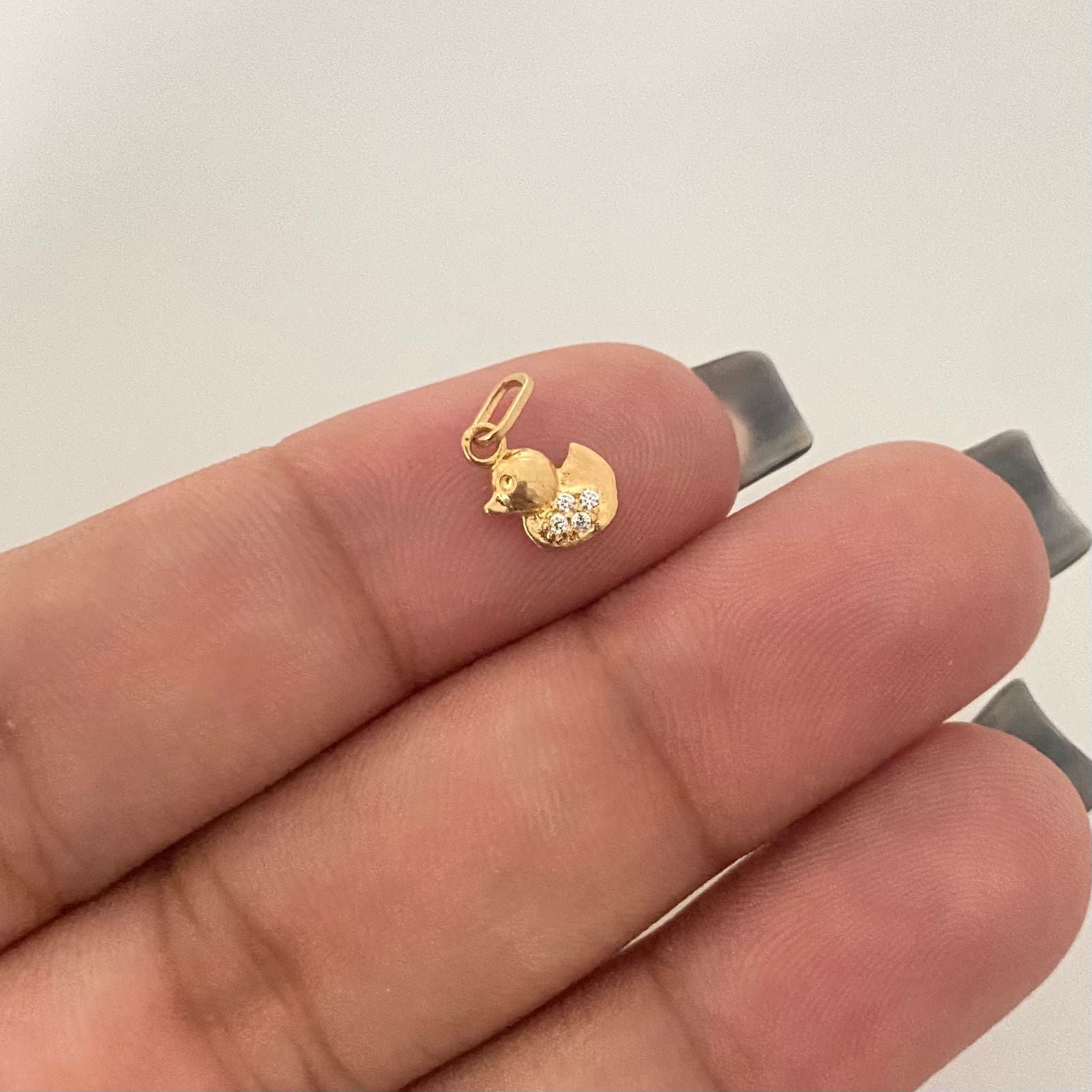Dije mini pato casting Oro amarillo 18k 0,35 Gr / 1,2 Cm