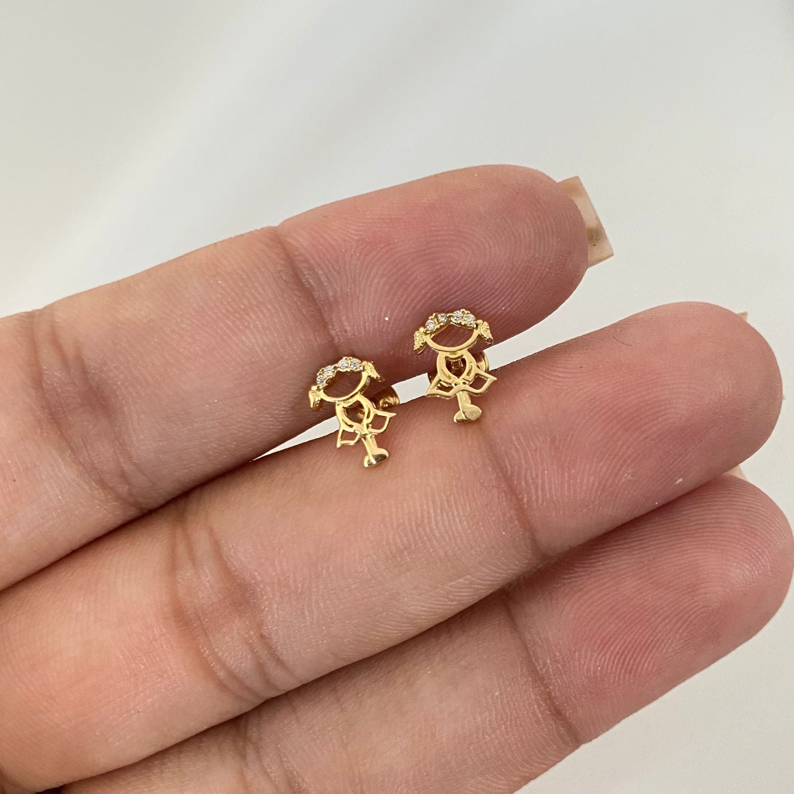 Topos silueta niña casting Oro amarillo 18k 0,9 Gr / 6,3 mm