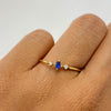 Anillo Solitario circon azul oscuro Oro amarillo 18k / Talla 8 / 0,85 Gr / 0,9 mm