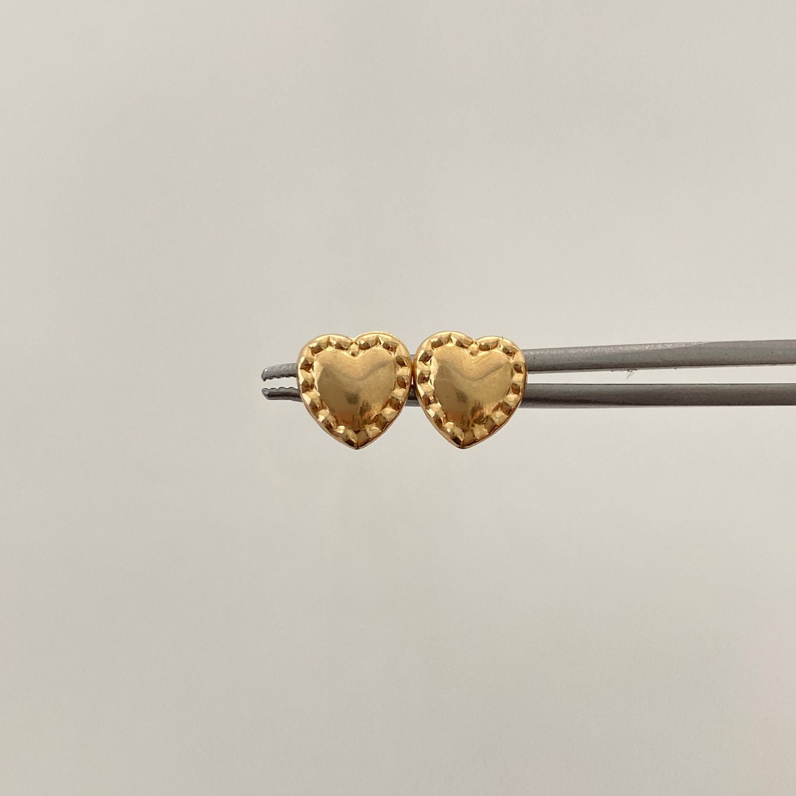 Topos Corazon Borde Oro amarillo 18k 0,75 Gr / 8,1 mm