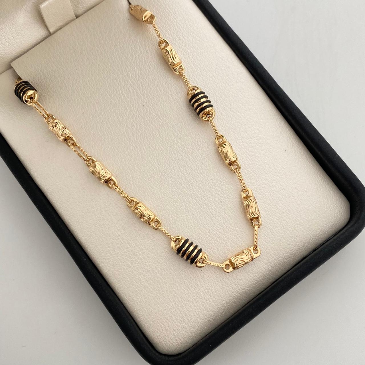 Cadena rustica con barriles diamantados y cauchos negros  Oro amarillo 18k 12,75 Gr / 4,4 mm / 60 Cm Broche 0,60
