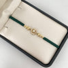 Pulsera tejida con herraje rx y bolas diamantadas 5mm - 4mm y 3mm Oro amarillo 18k 1,55 Gr