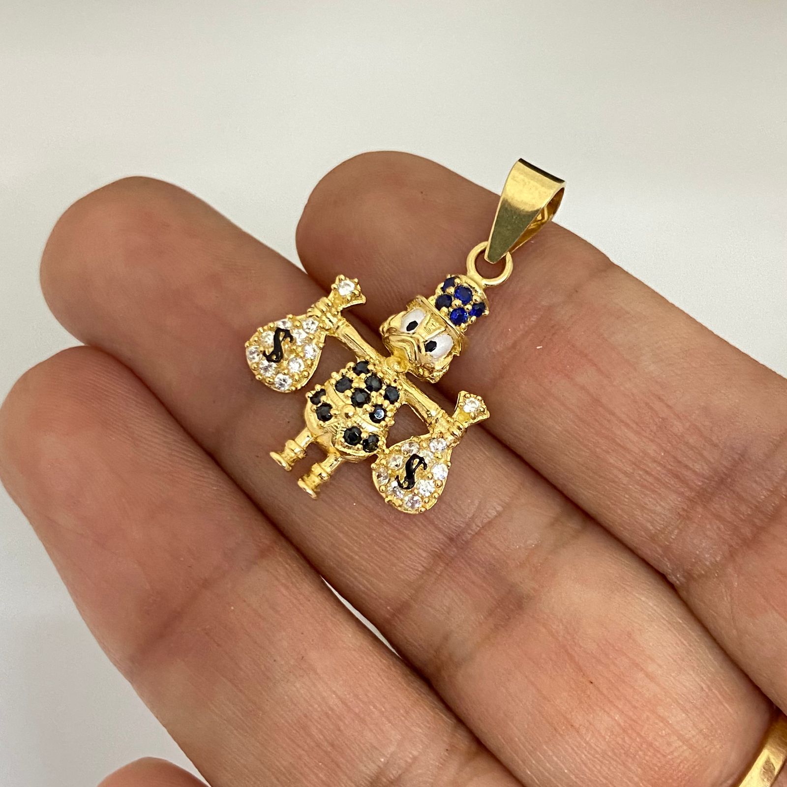 Dije tío rico casting central negro Oro amarillo 18k 2,85 Gr / 3,0 Cm