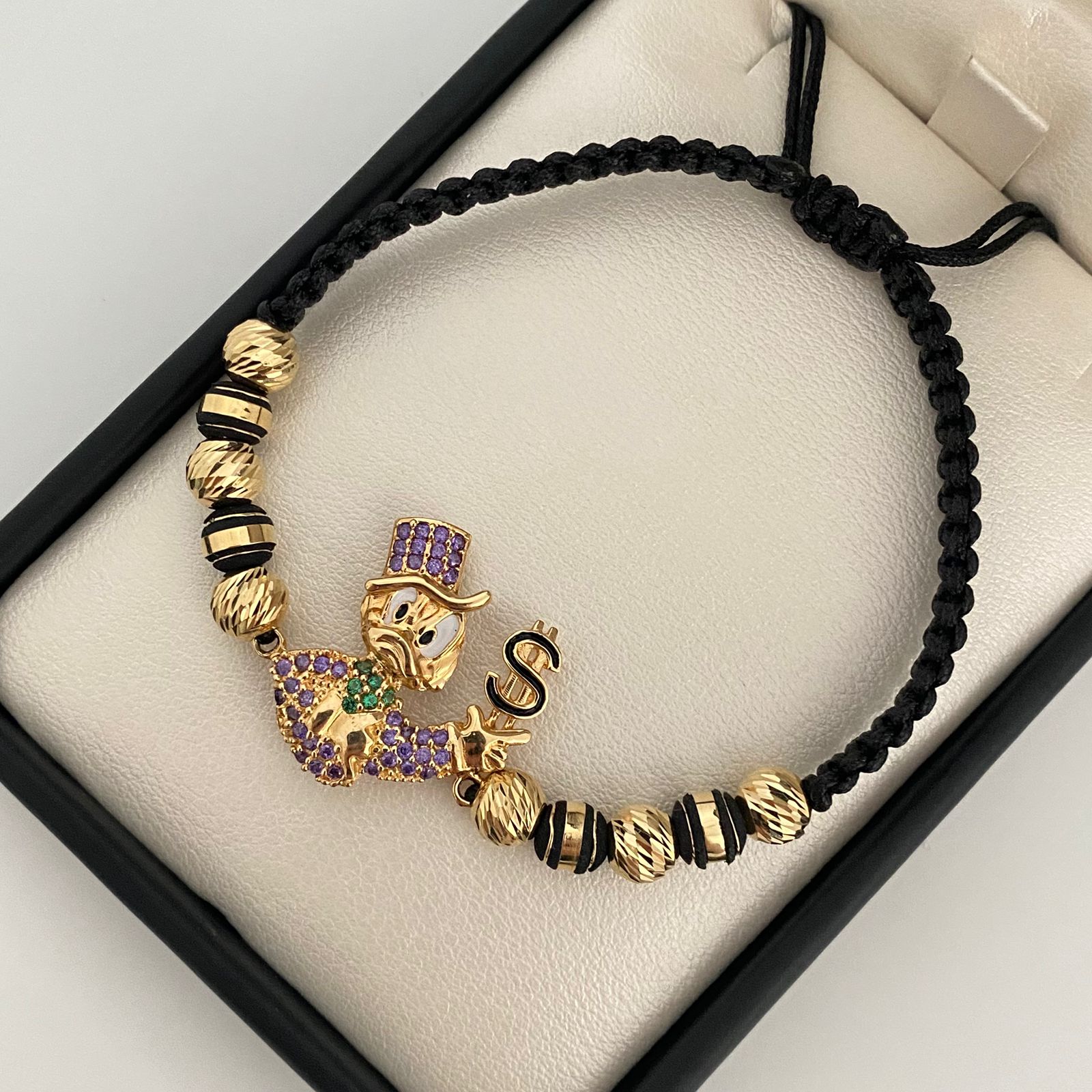 Pulsera tejida pato casting lila signo pesos balines diamantados #6 neoros 3 rayas #6 Oro amarillo 18k 5,65 Gr