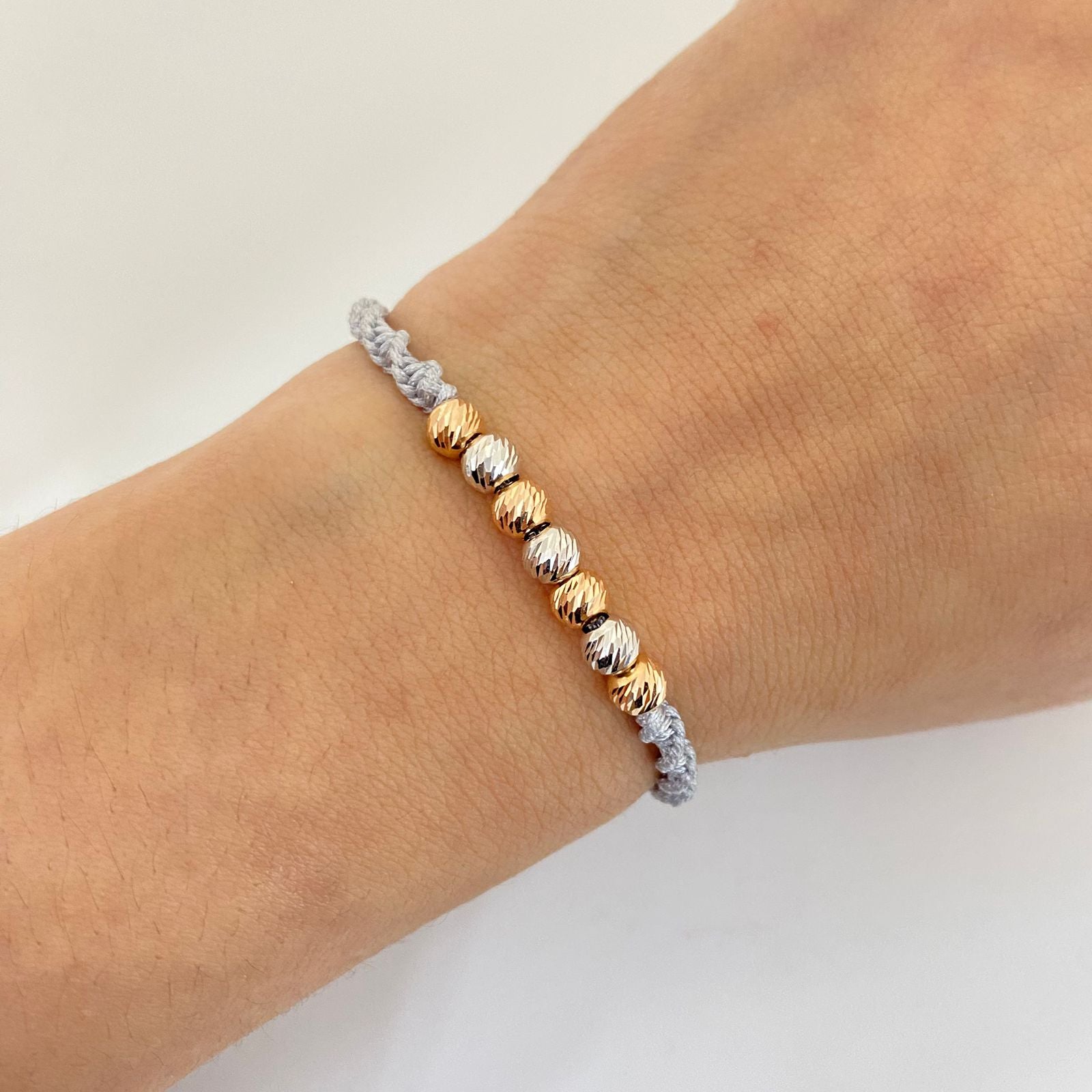 Pulsera tejida con bolas diamantadas 5mm  Oro blanco y Oro rosa 18k 1,05 Gr