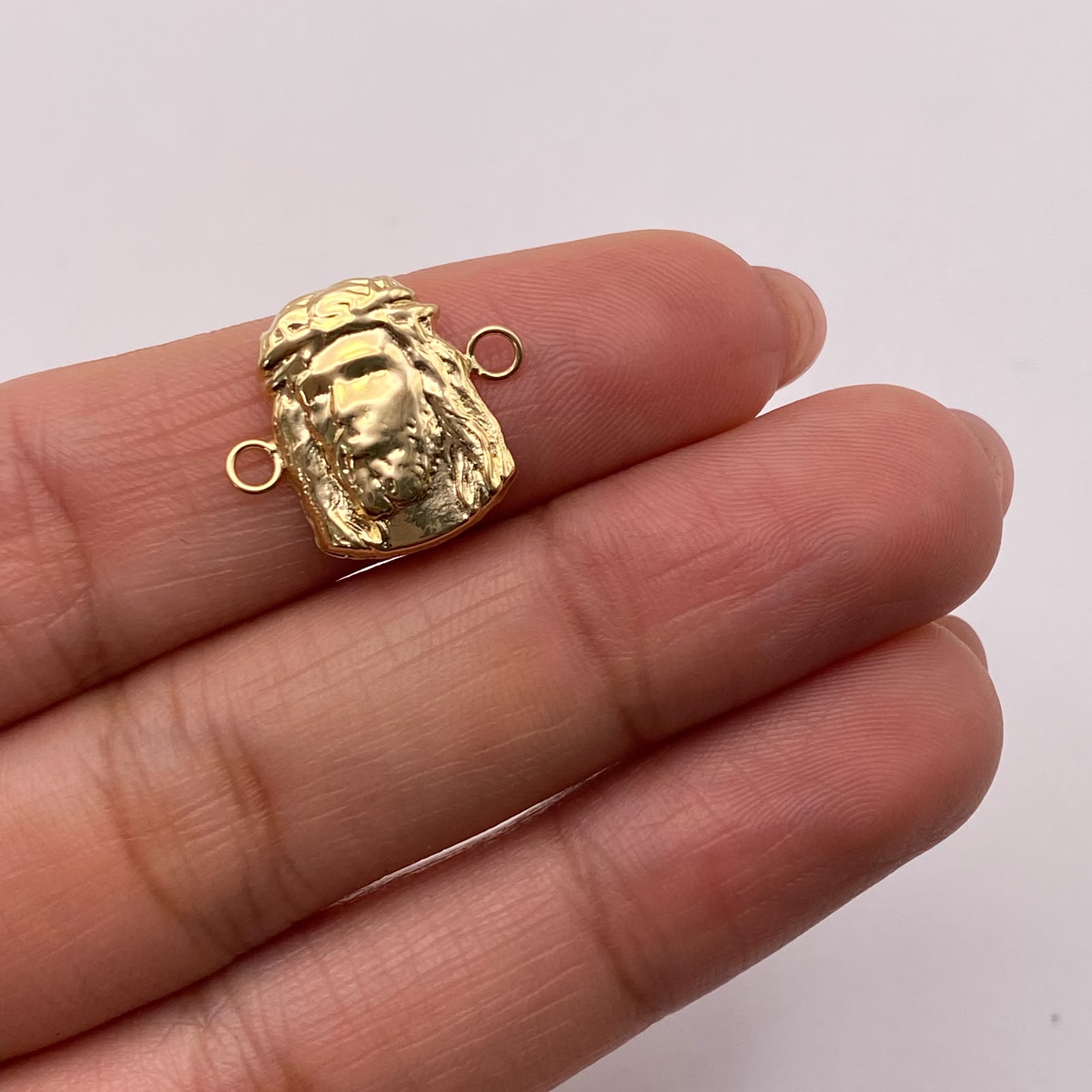 Herraje rostro jesus Oro amarillo 18k 0,87 Gr / 1,7 Cm