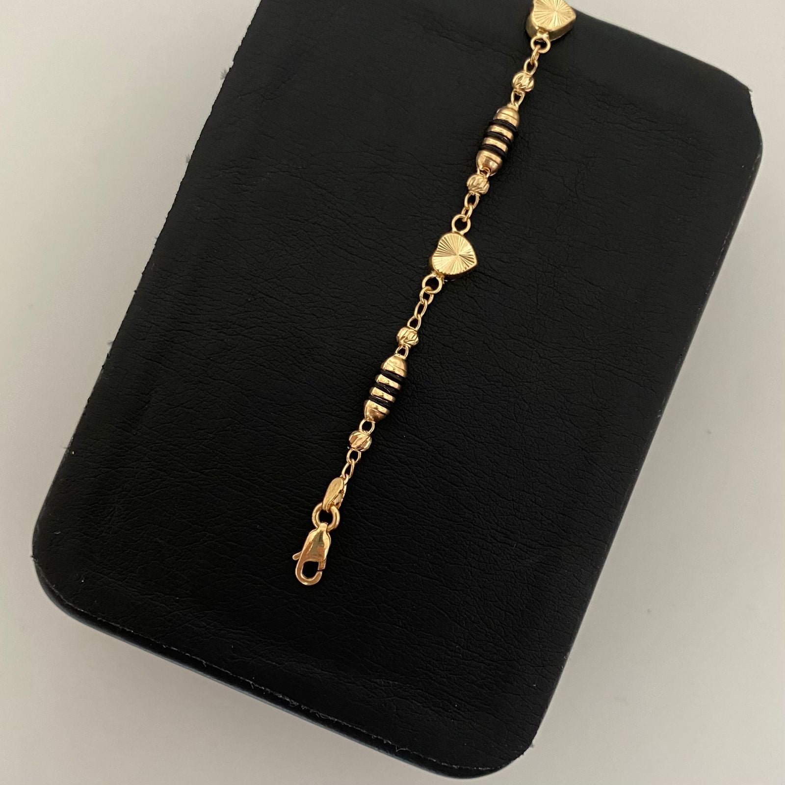 Pulso rustico corazones diamantados barriles cauchos negros Oro amarillo 18k 4,30 Gr / 6,3 mm / 19 Cm Broche 0,40