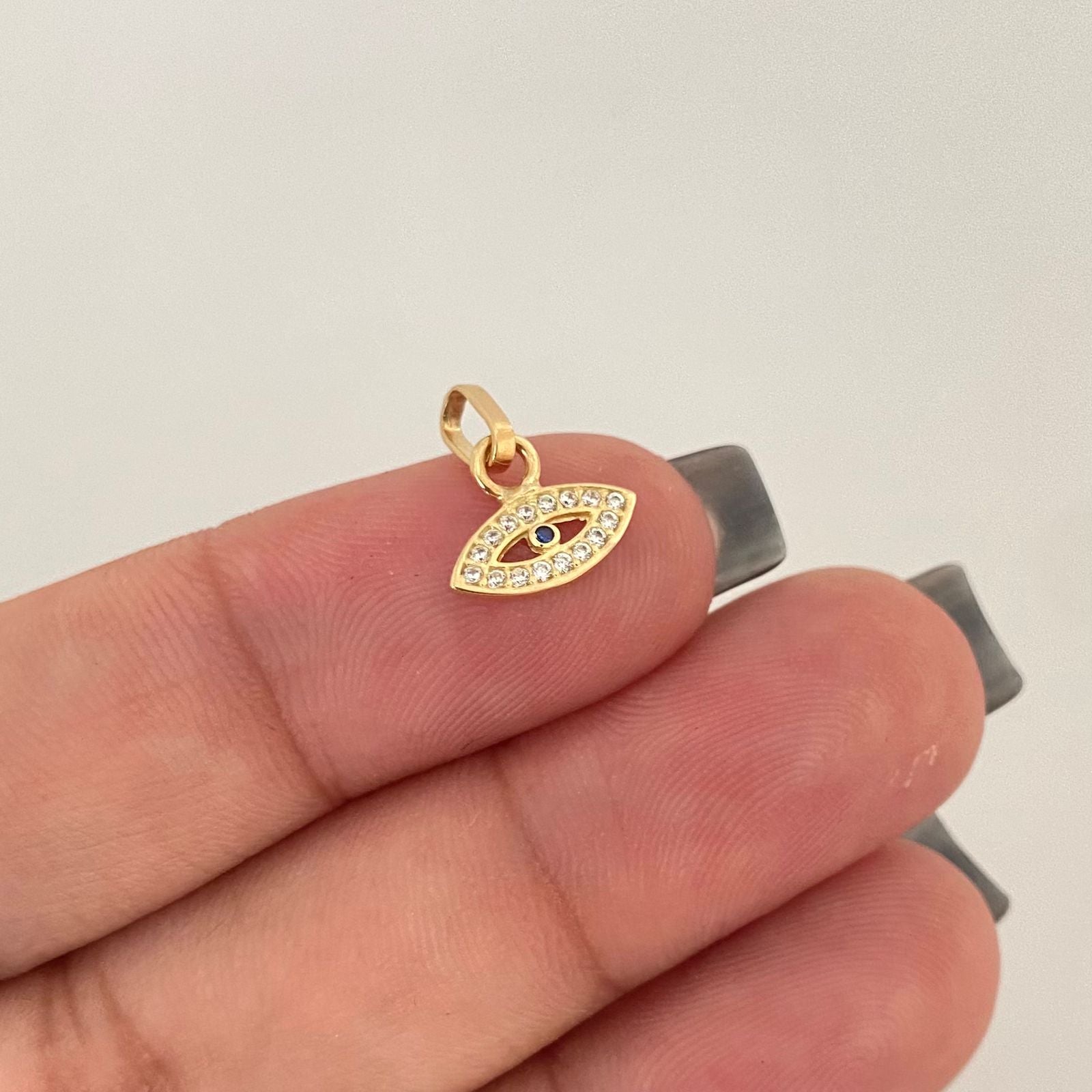 Dije ojo azul casting Oro amarillo 18k 0,5 Gr / 1,5 Cm